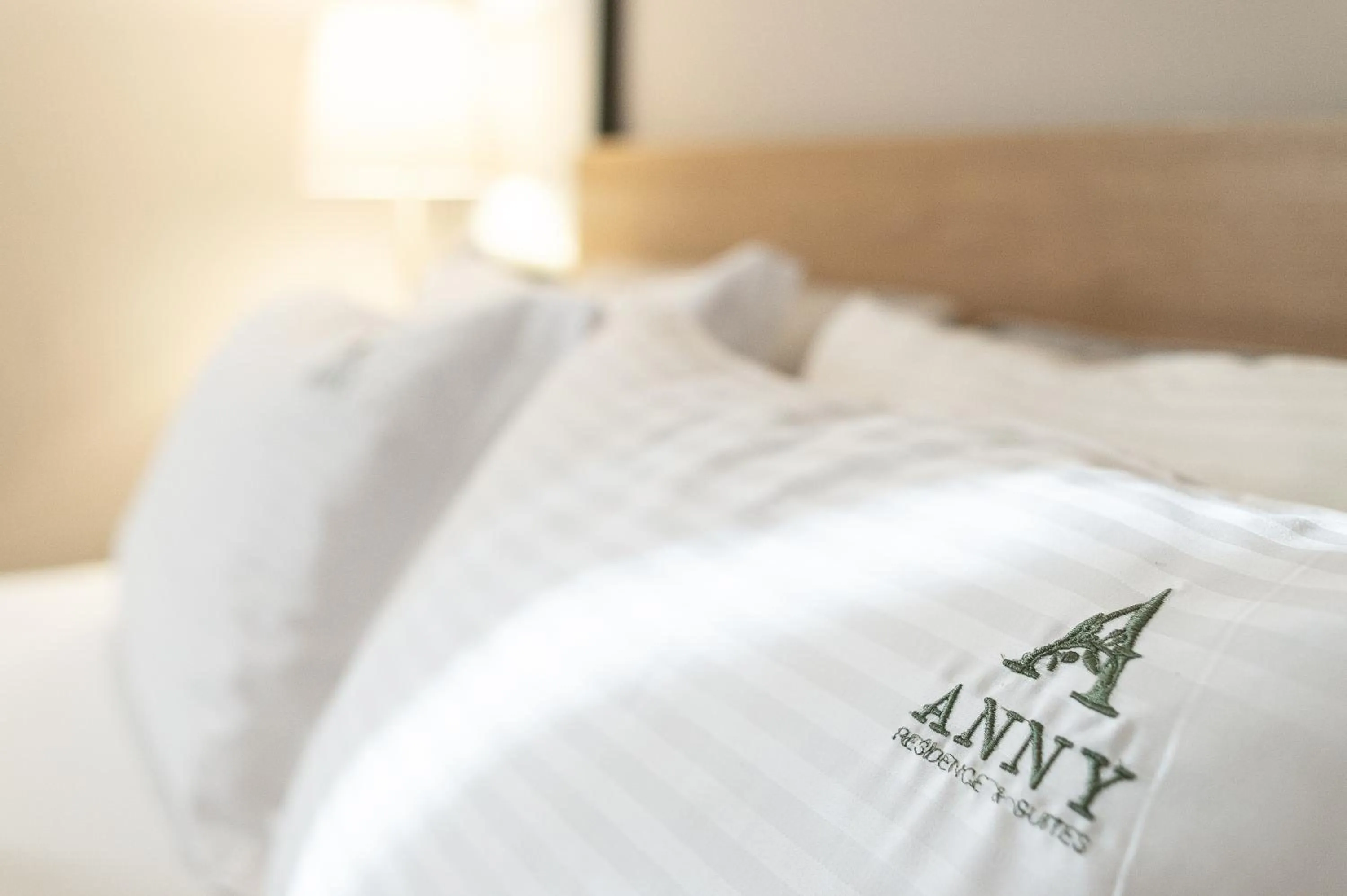 Bed in Anny's Residences & Suites