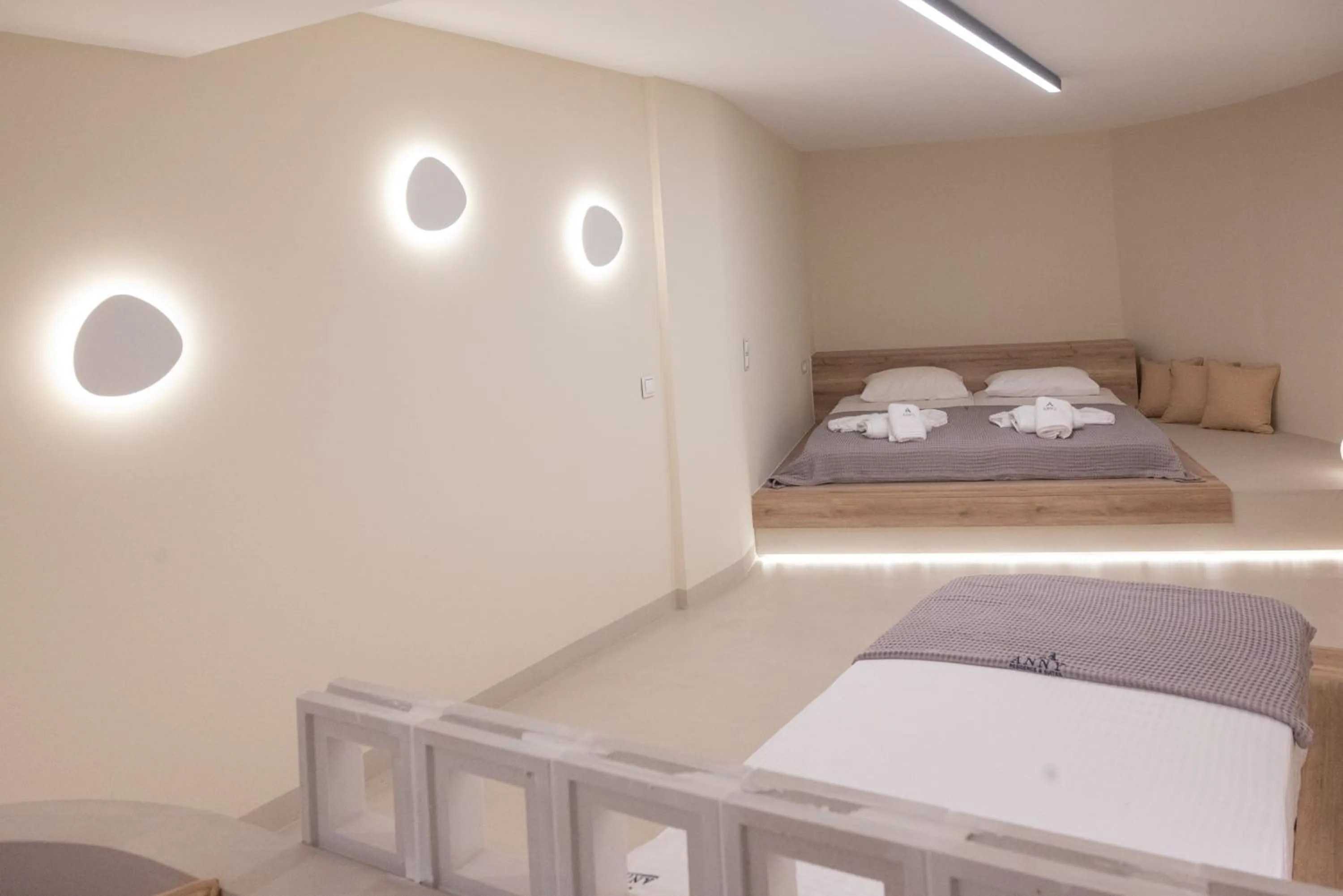 Bed in Anny's Residences & Suites