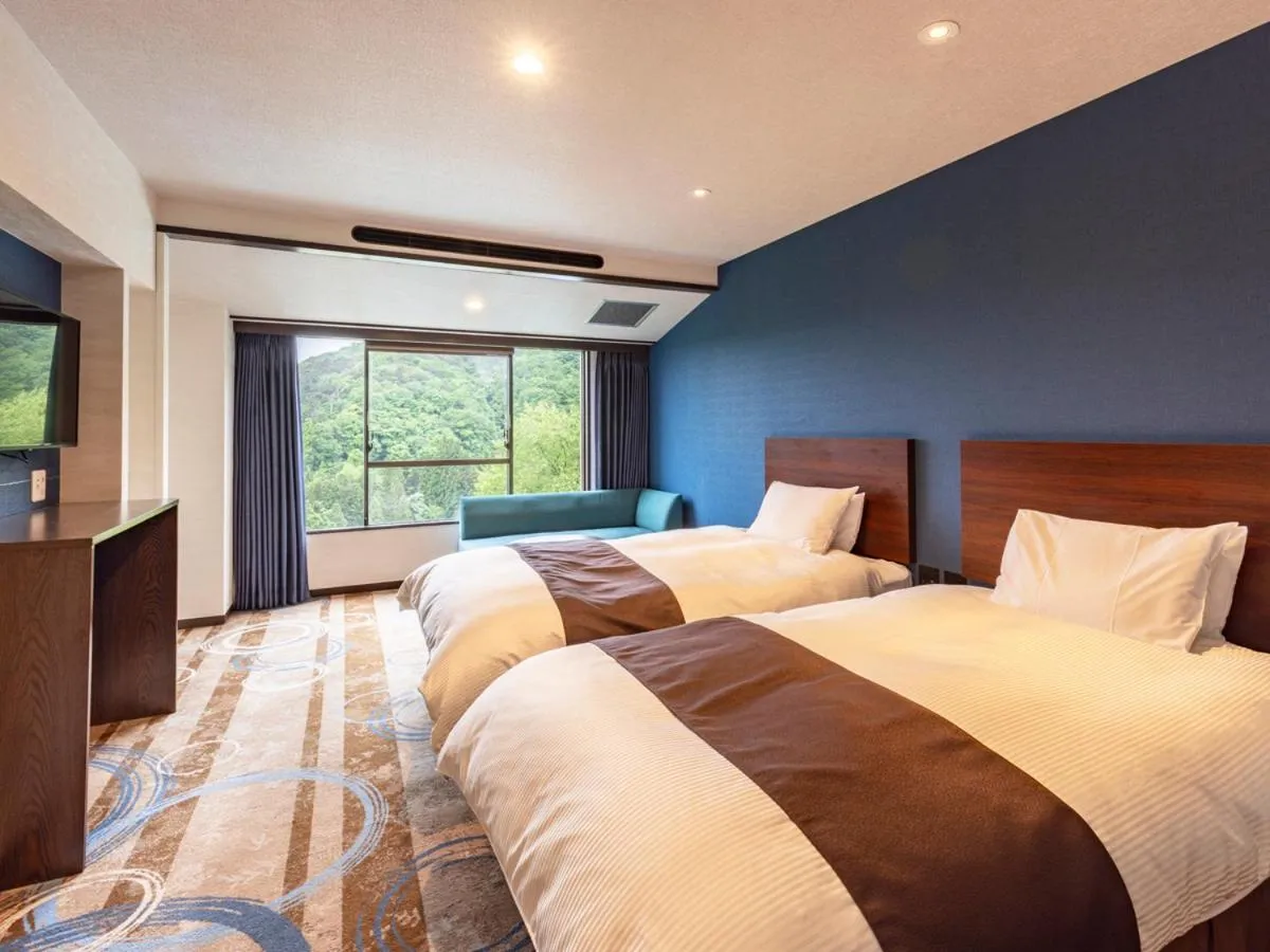 Bed in Hotel Senshukaku