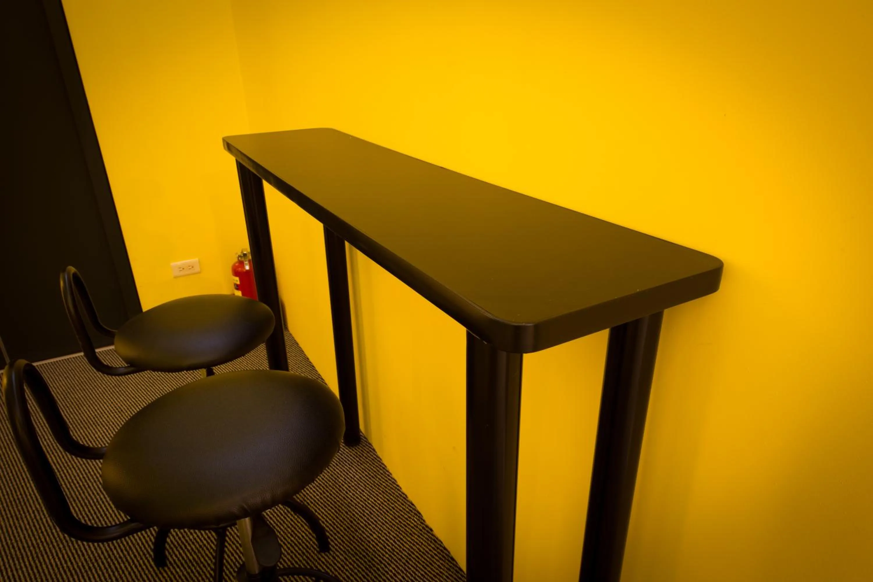 Seating area in SleepBox Hostel