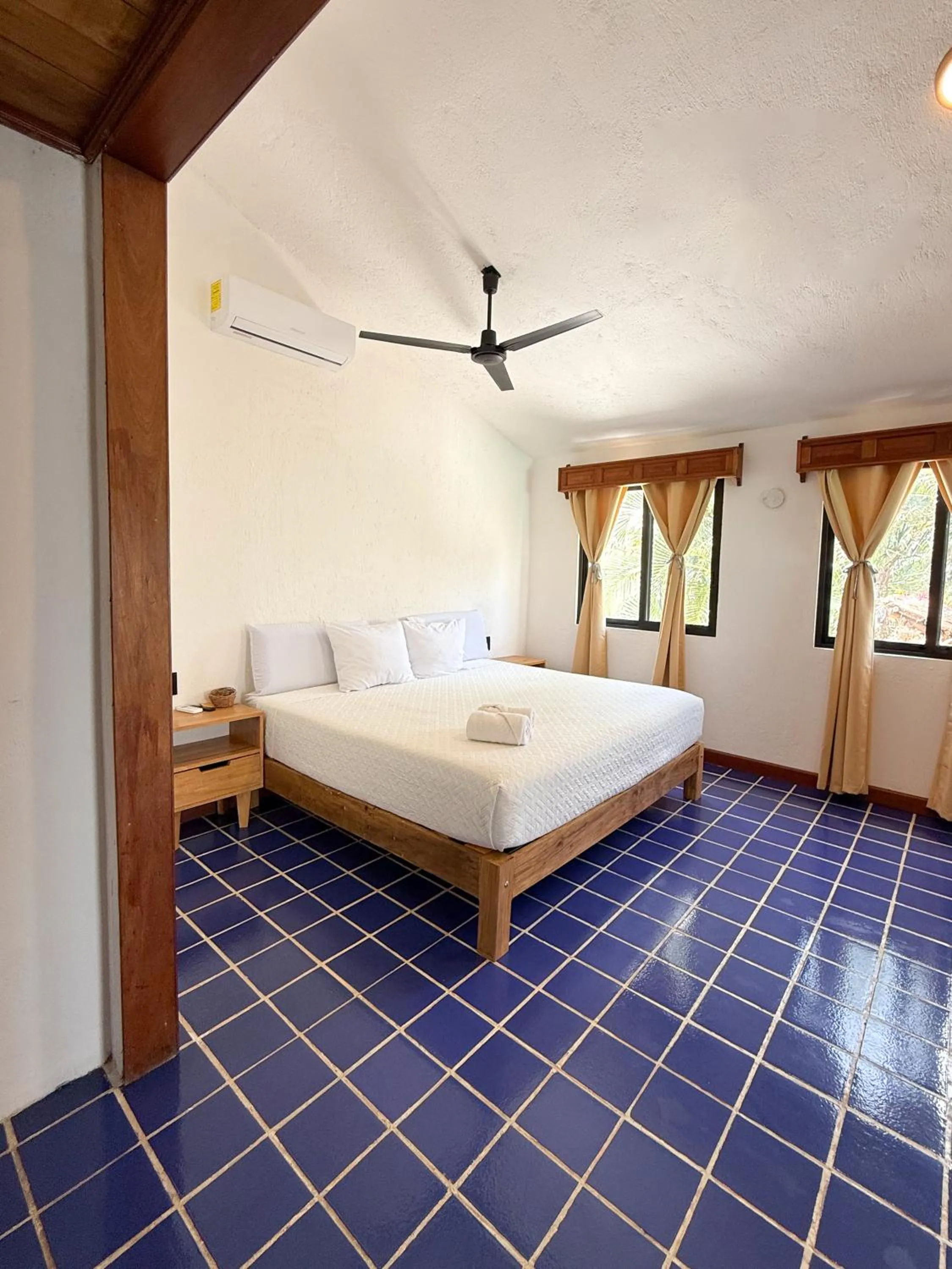 Bed in Hotel Solana Bacalar Lakefront