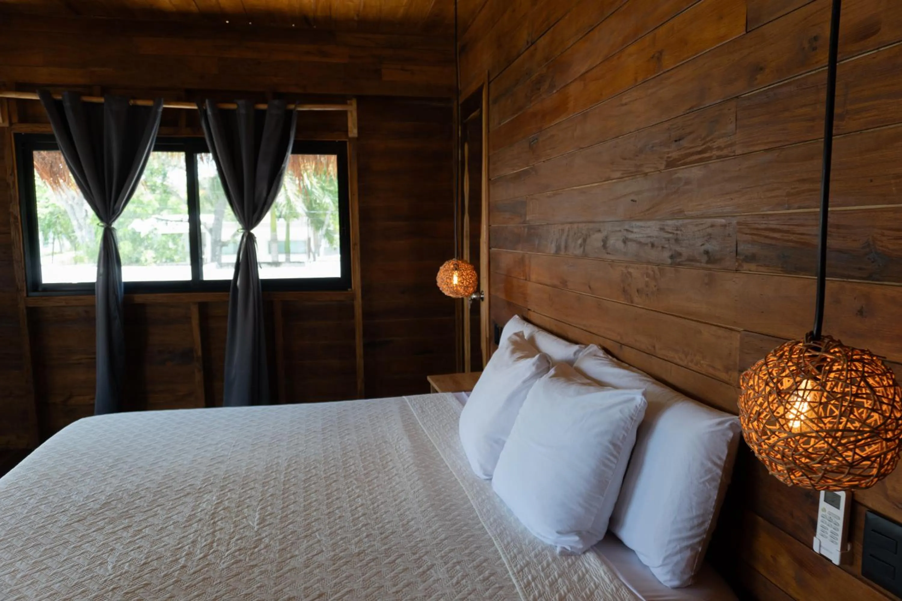 Bed in Hotel Solana Bacalar Lakefront