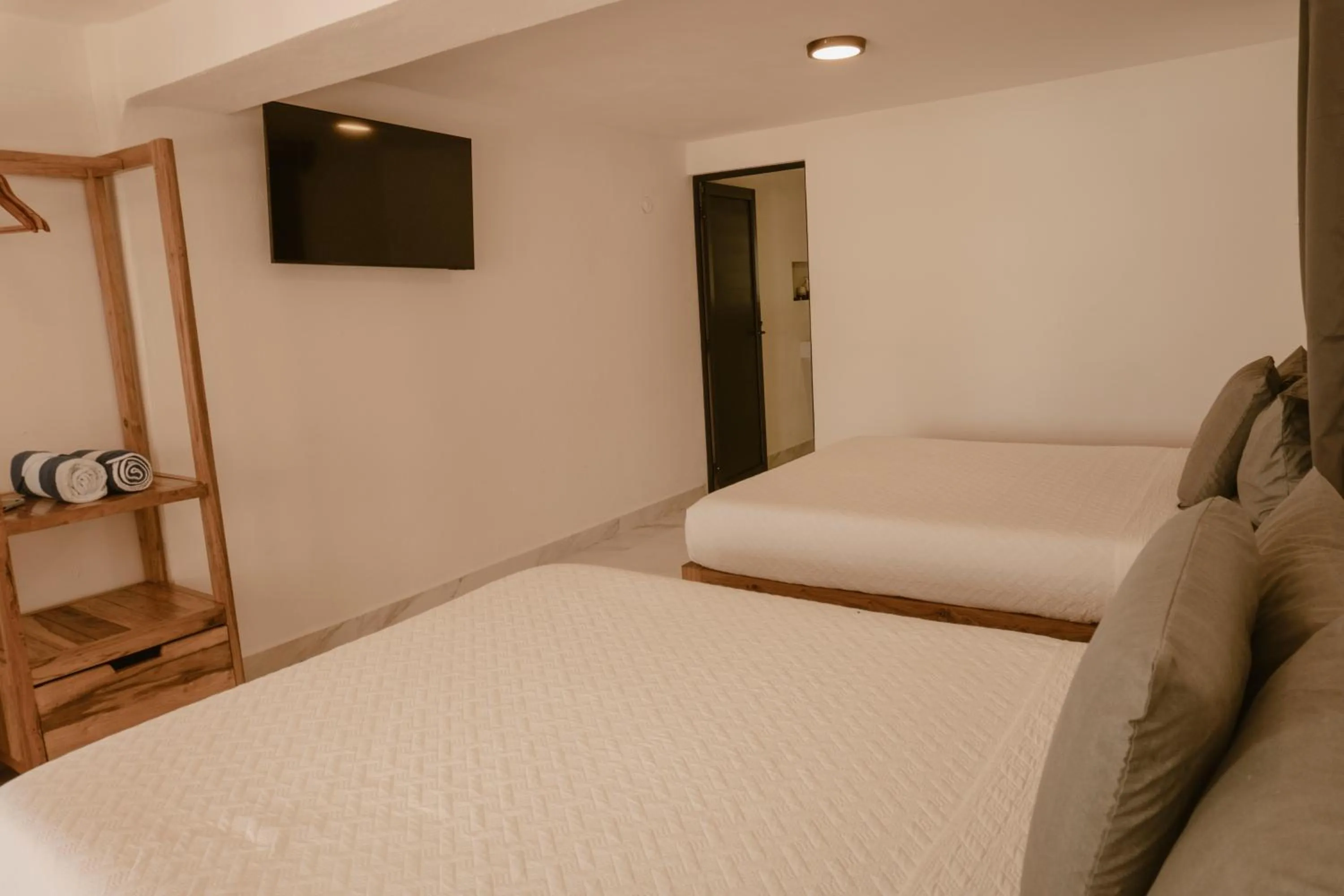 Bed in Hotel Solana Bacalar Lakefront