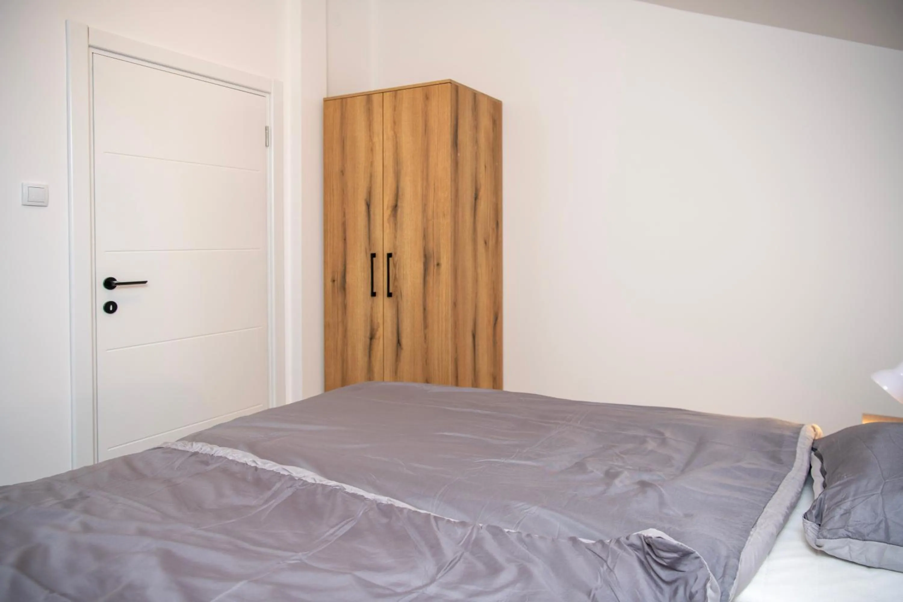 wardrobe, Bed in Velora apartments