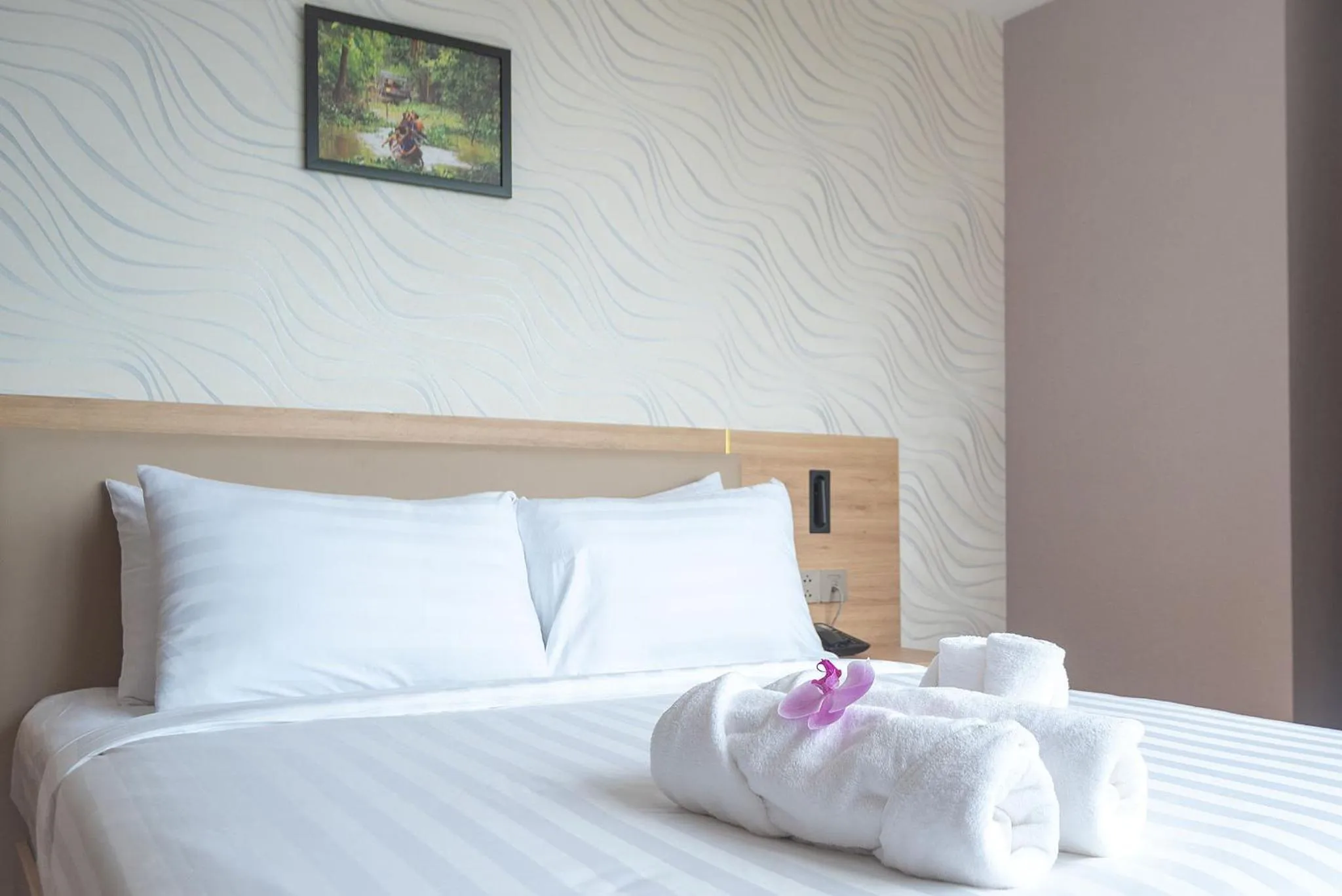 Bed in Bamboo Riverside Boutique Hotel