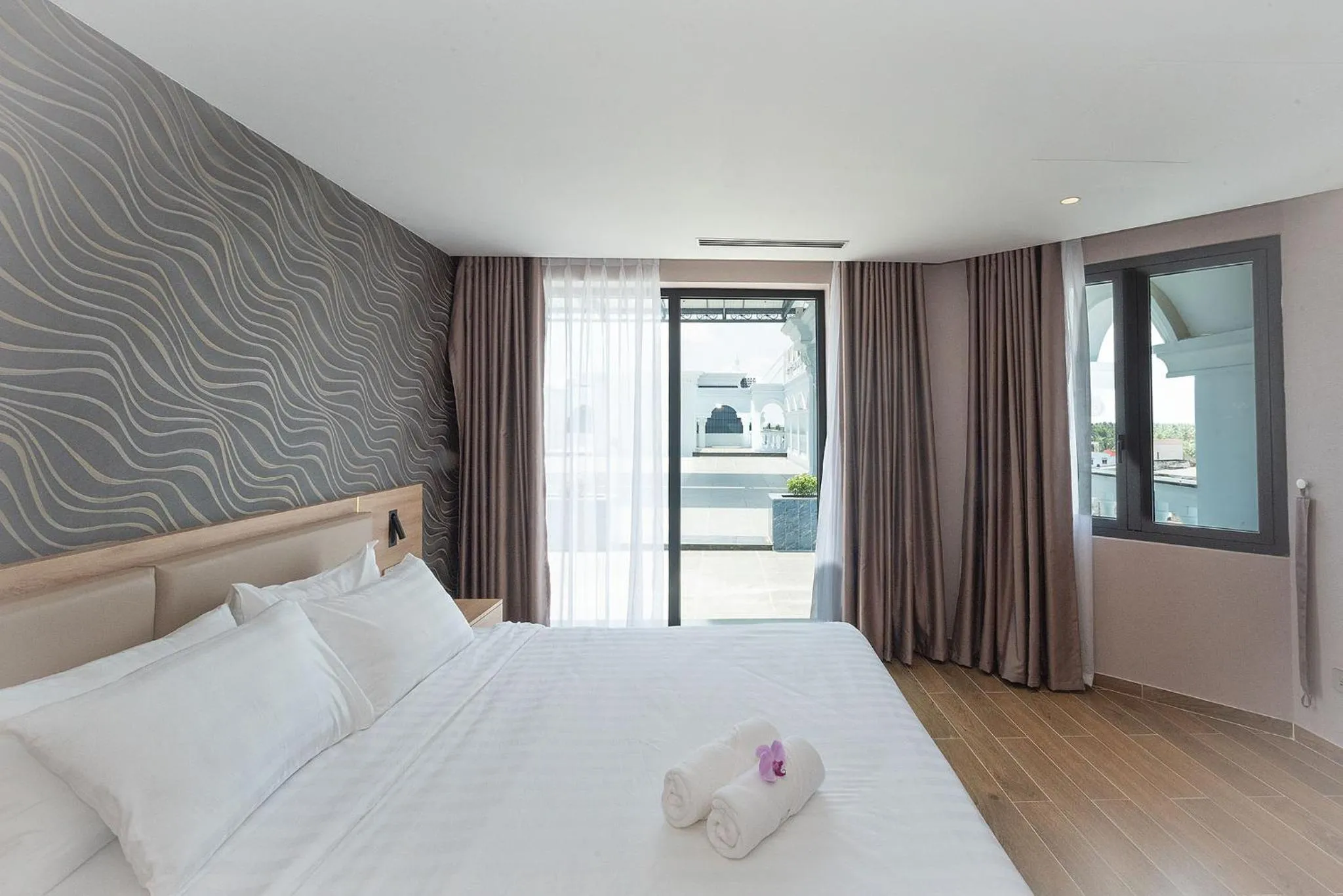 Bed in Bamboo Riverside Boutique Hotel