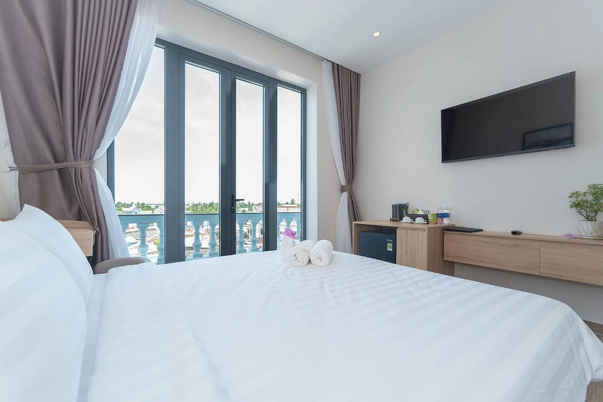 Bed in Bamboo Riverside Boutique Hotel