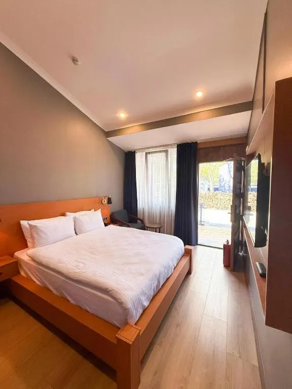 Bed in Navy Inn & Bungalows