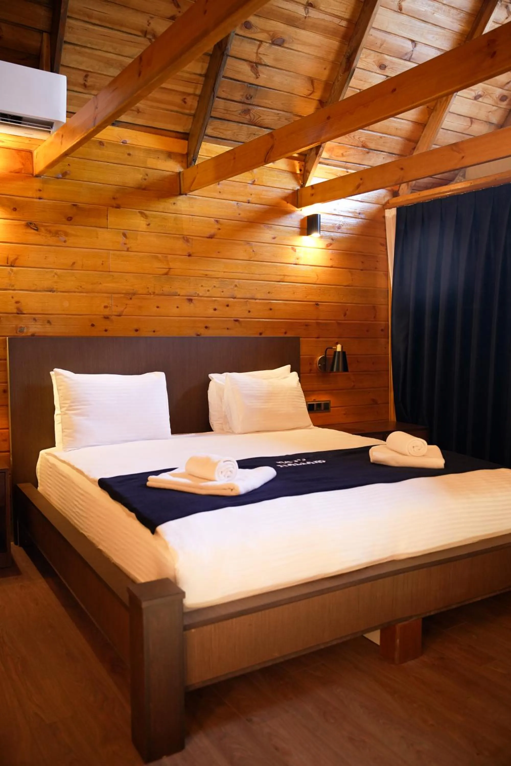 Bed in Navy Inn & Bungalows