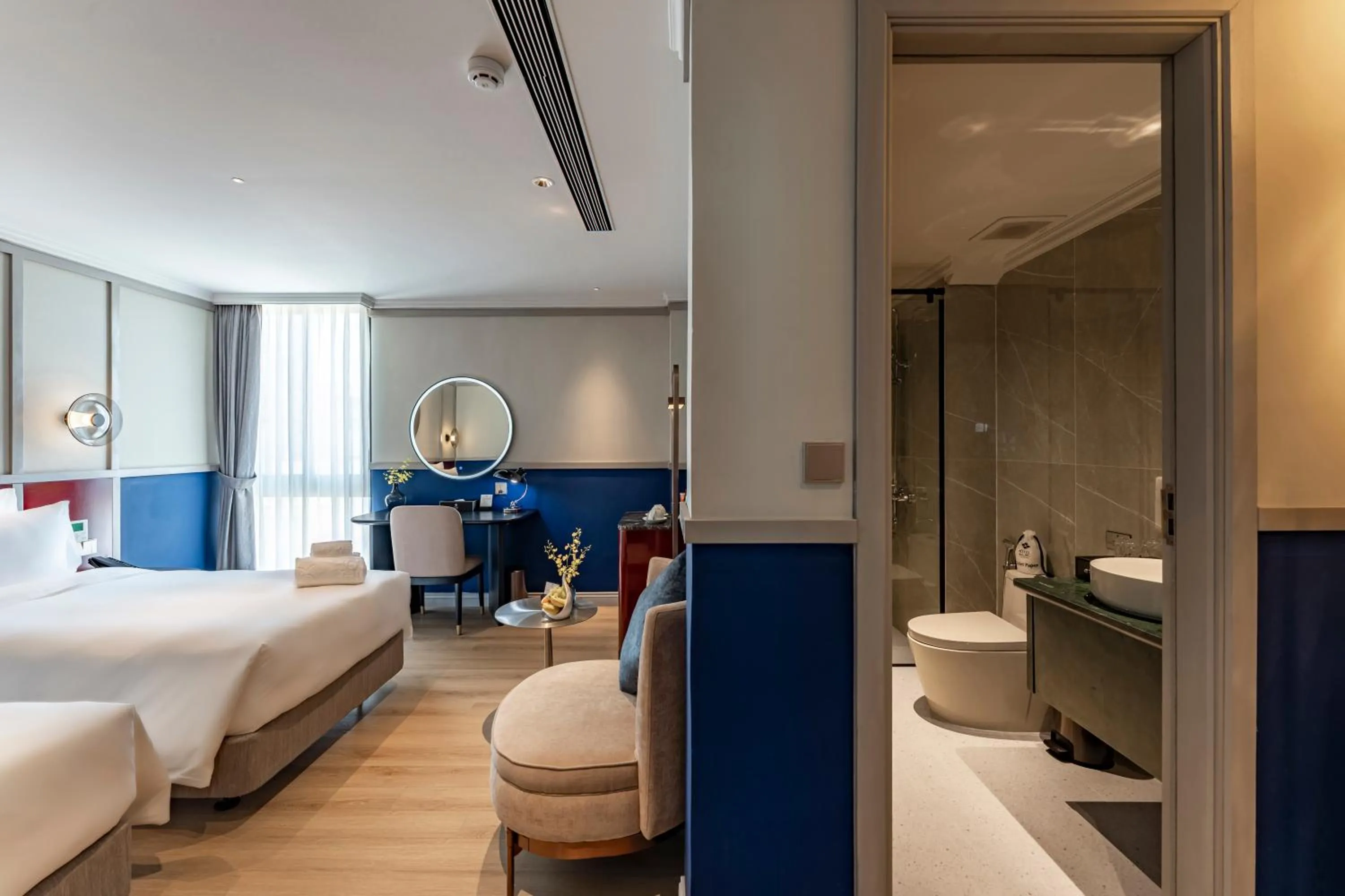 Bathroom, Bed in GRAND HOTEL du LAC Boutique Saigon