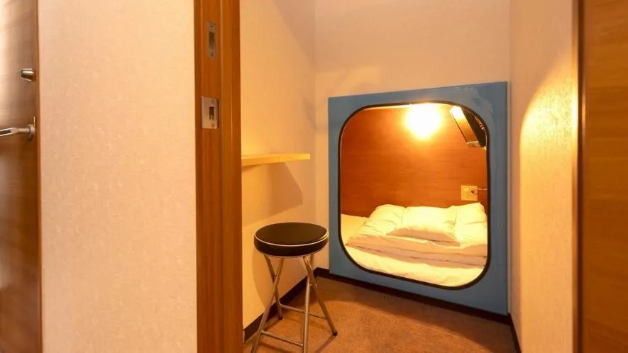 Bed in New Gloria Oita Hotel