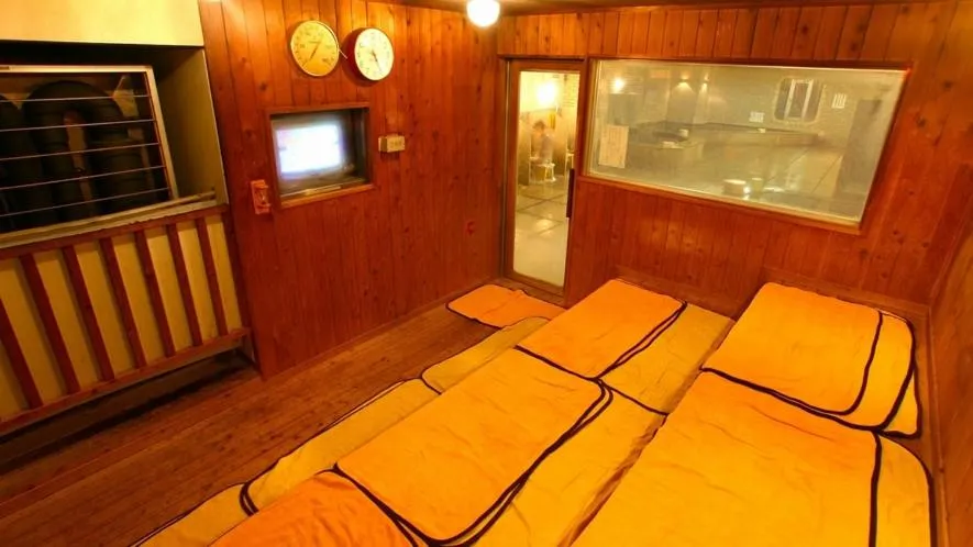 Bed in New Gloria Oita Hotel