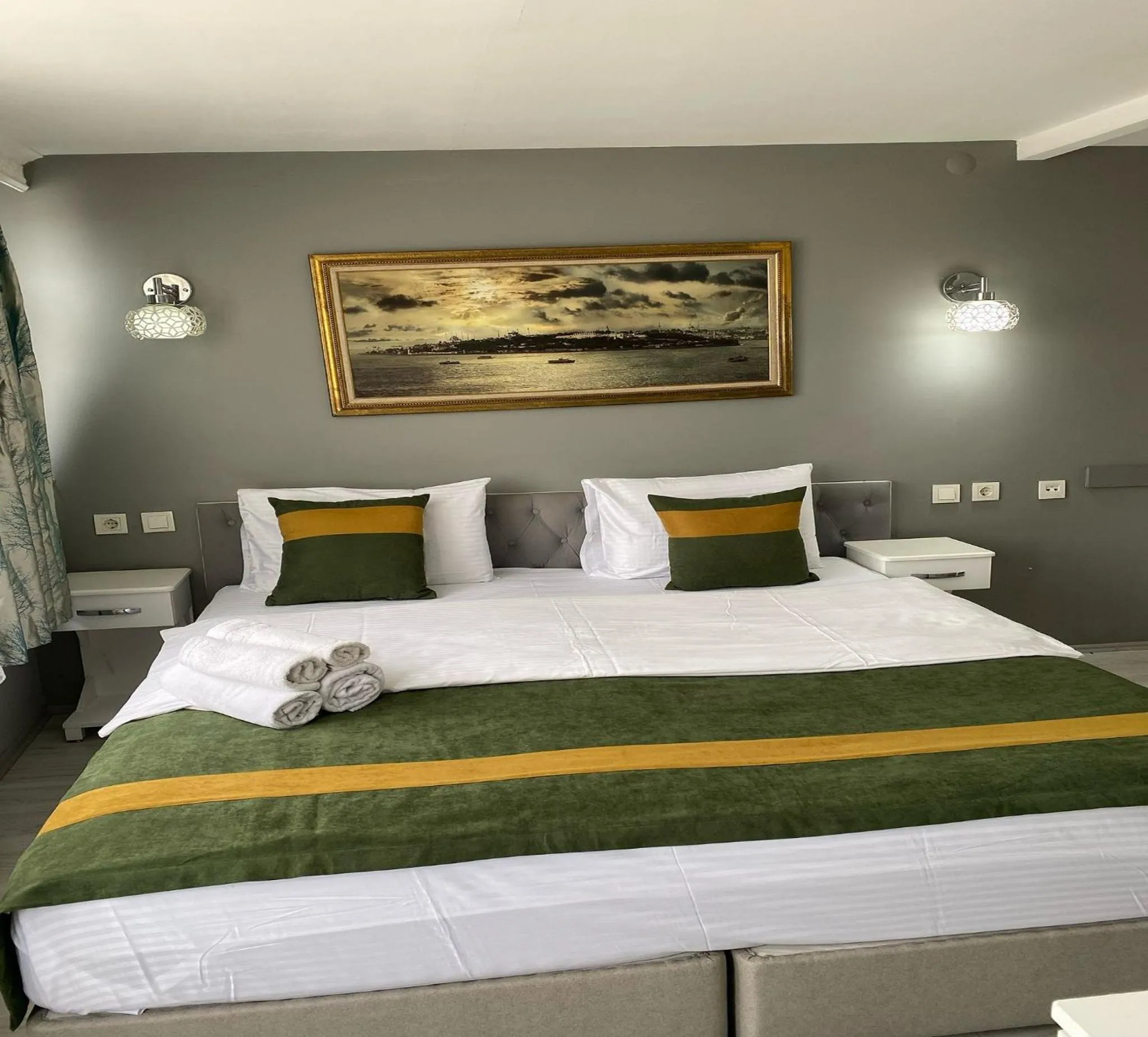 Bed in Unique Suite Hotel