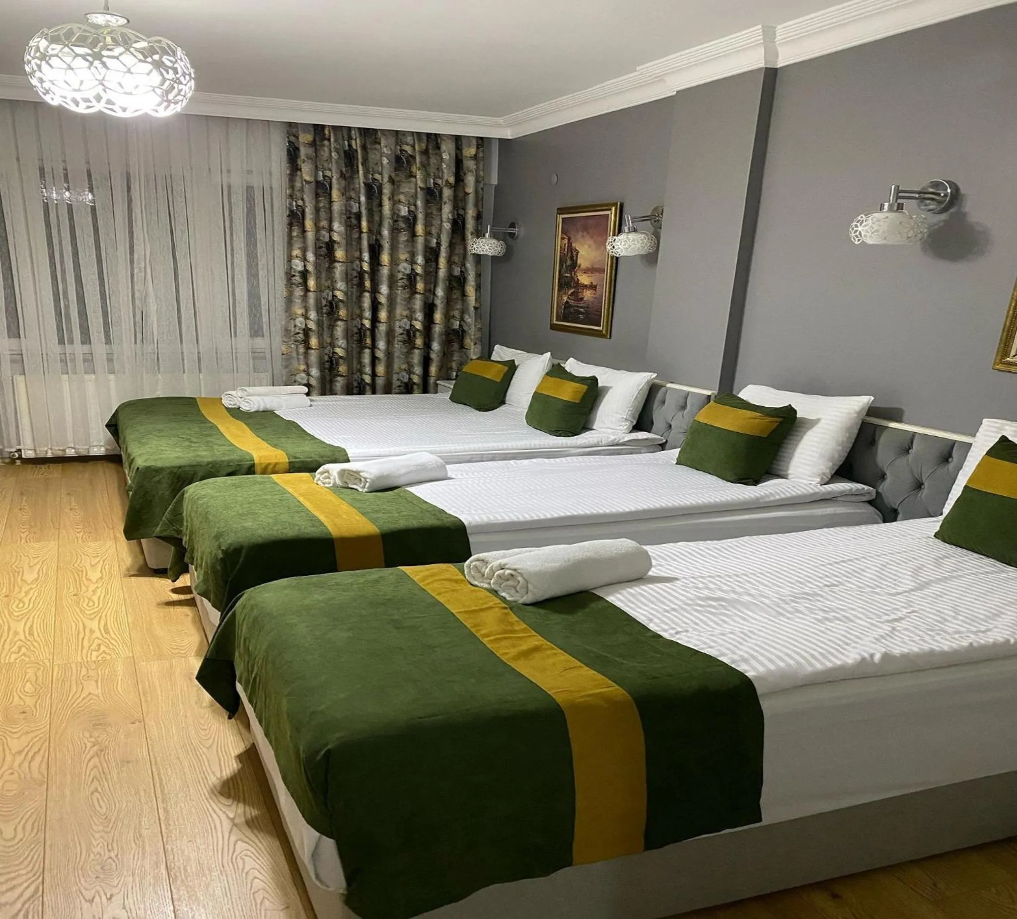 Bed in Unique Suite Hotel