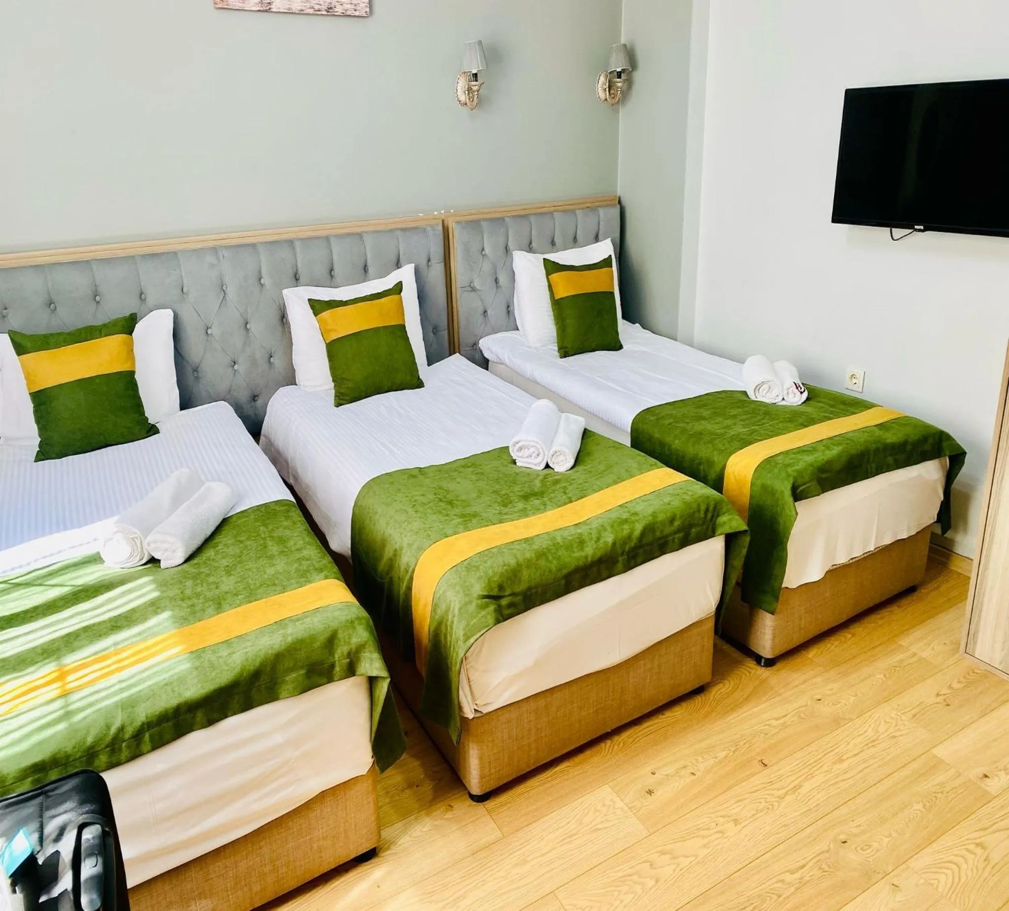 Bed in Unique Suite Hotel