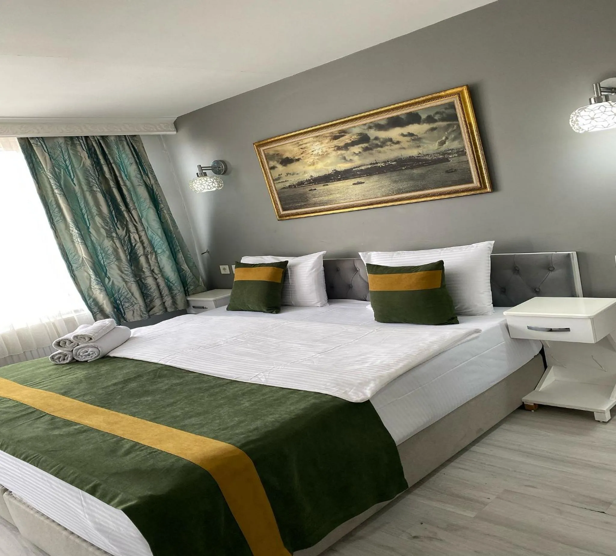 Bed in Unique Suite Hotel