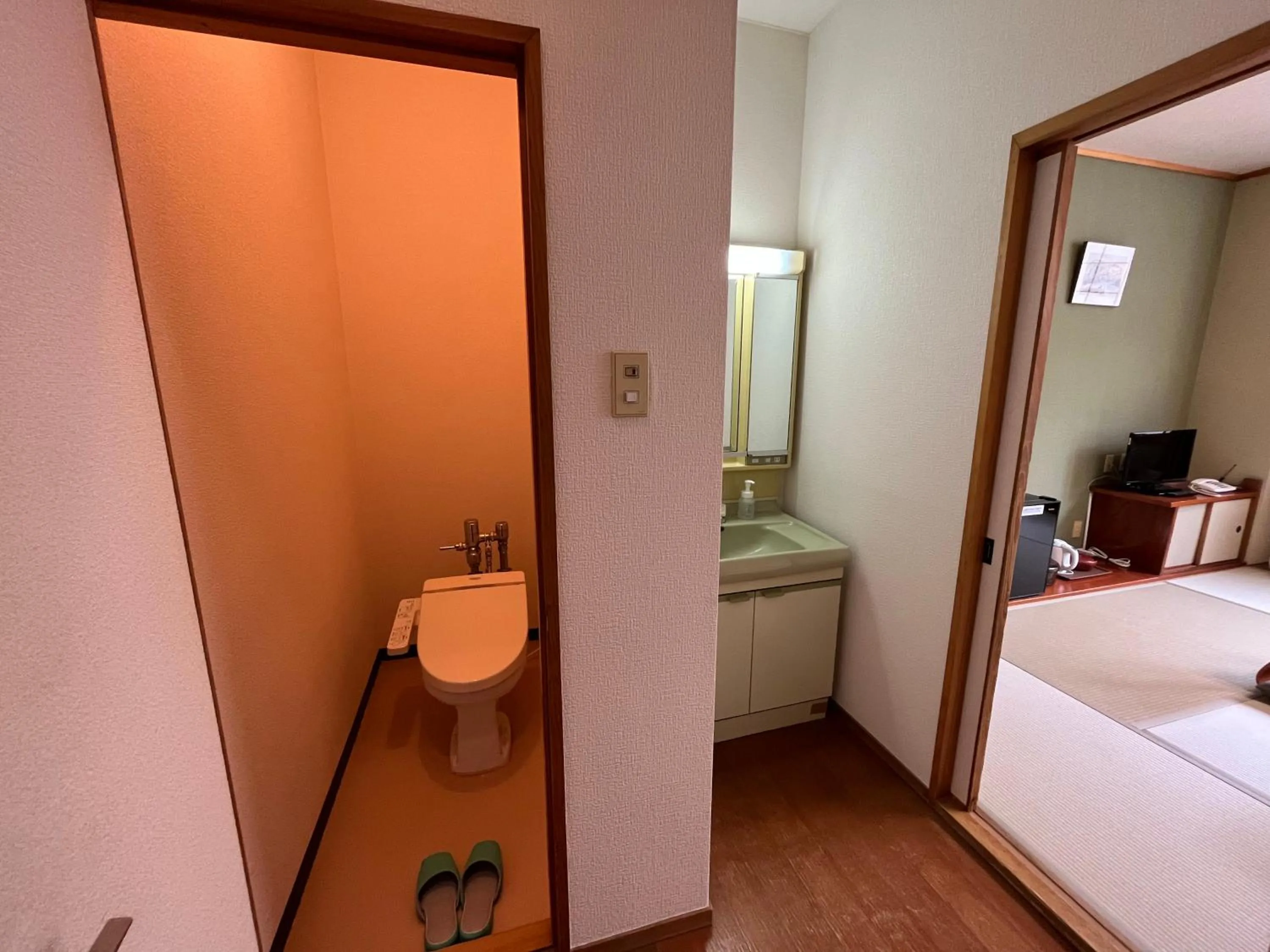 Toilet, Bed in Sapporo's Secret Onsen Sanctuary Marukoma Onsen Ryokan