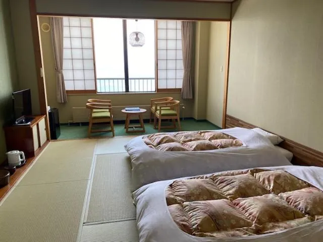 Bed in Sapporo's Secret Onsen Sanctuary Marukoma Onsen Ryokan