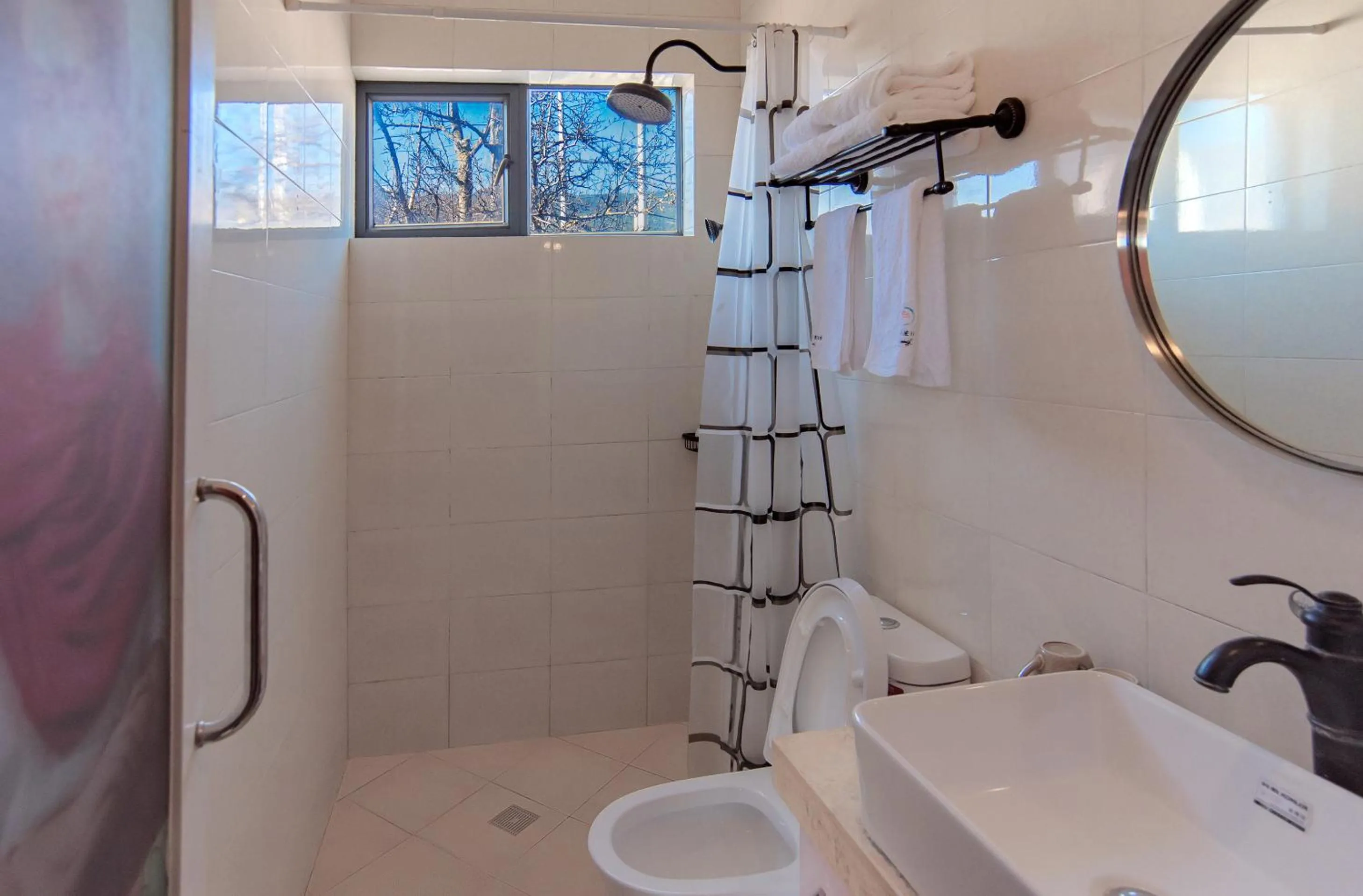 Bathroom in Baisha Flamingo Hotel