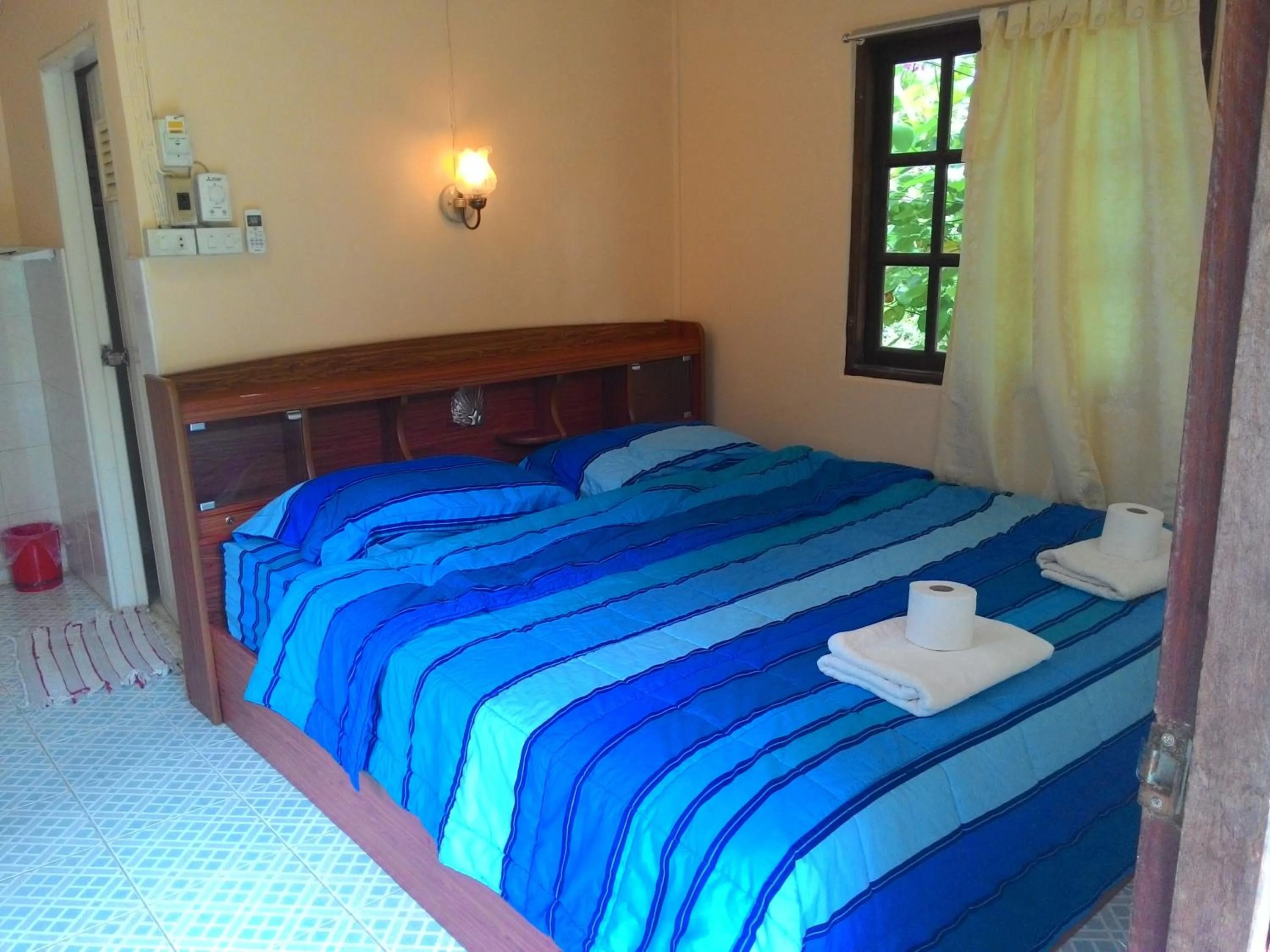 Bed in Blue Lotus Resort