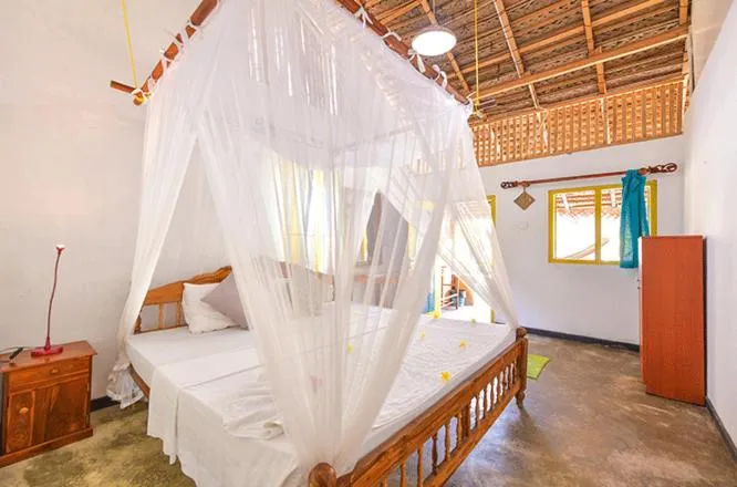 Balcony/Terrace, Bed in De Silva Wind Resort Kalpitiya - Kitesurfing School Sri Lanka