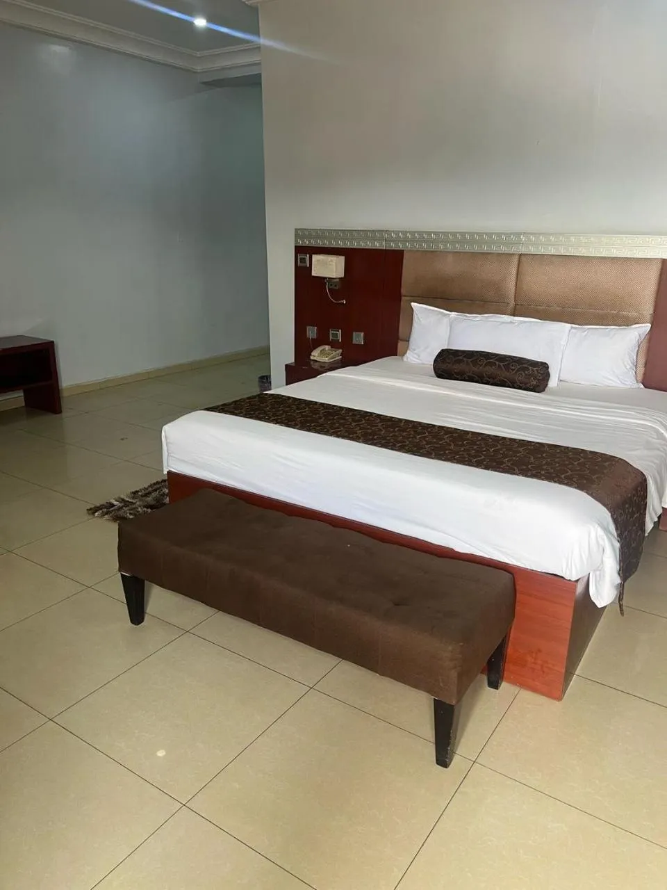 Bed in Nippon Grand Hotel and Apartment