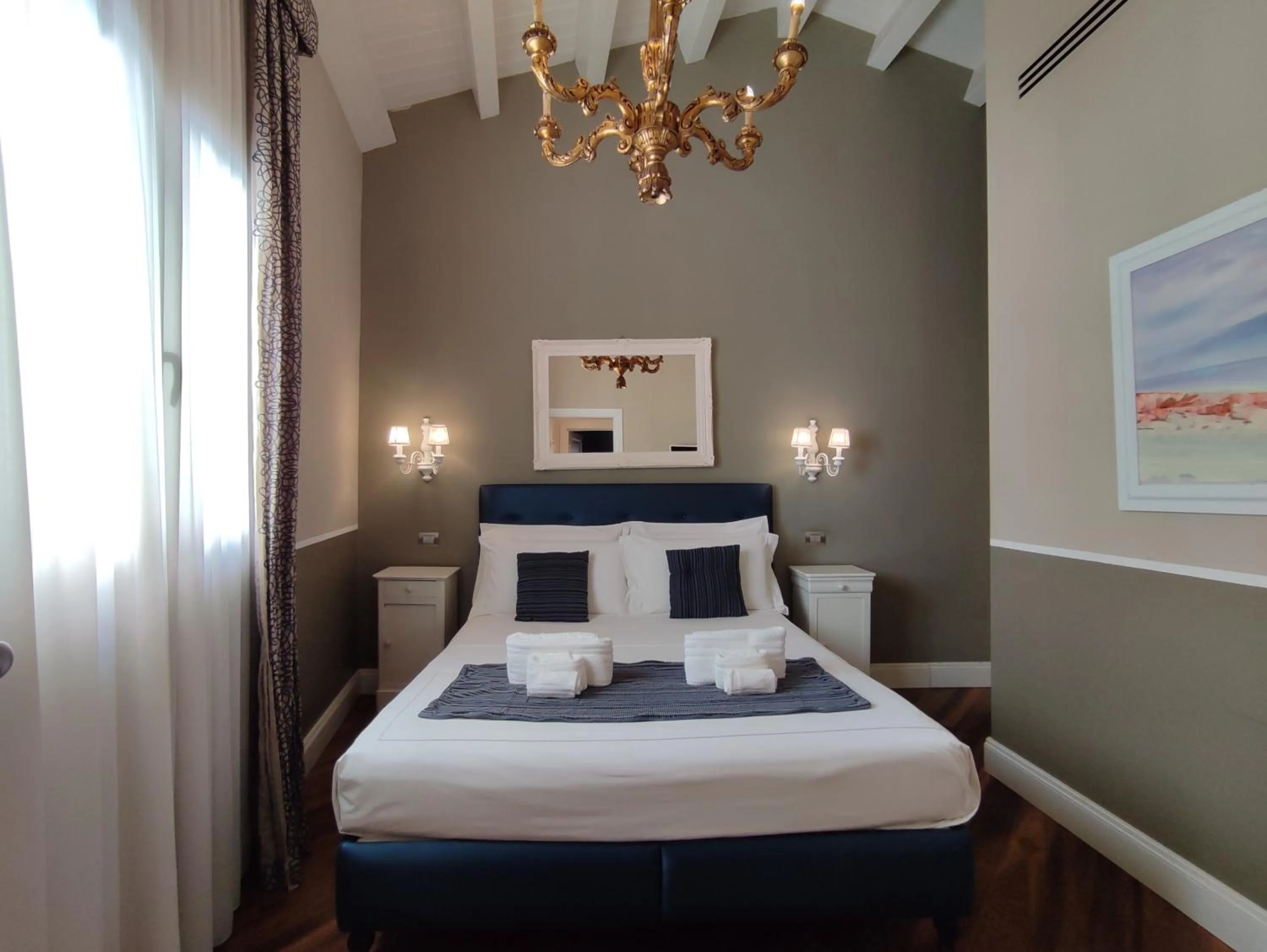 Bed in Dimora Bellini by Hotel Bellini sas