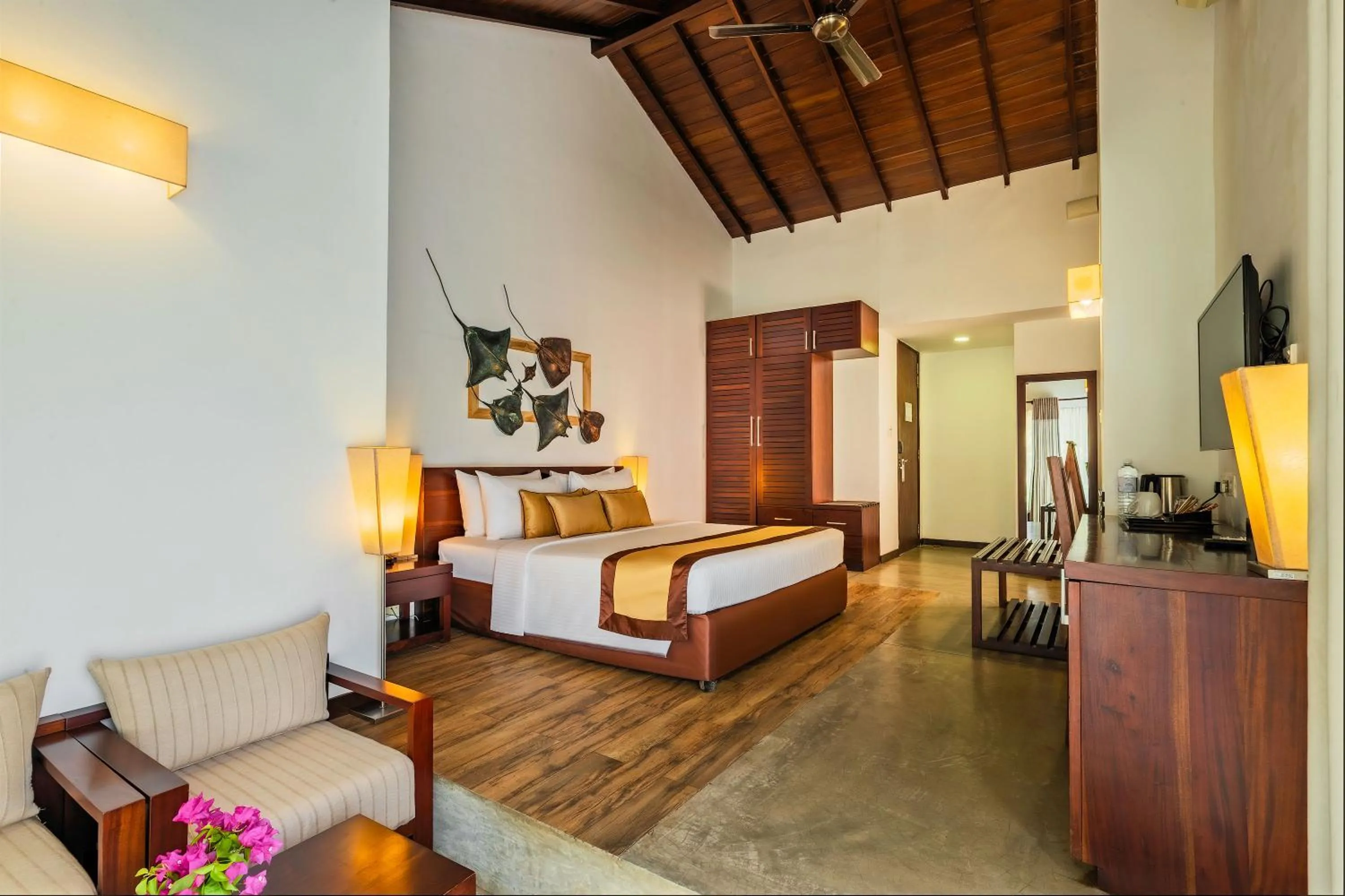 Bed in The Calm Resort & Spa