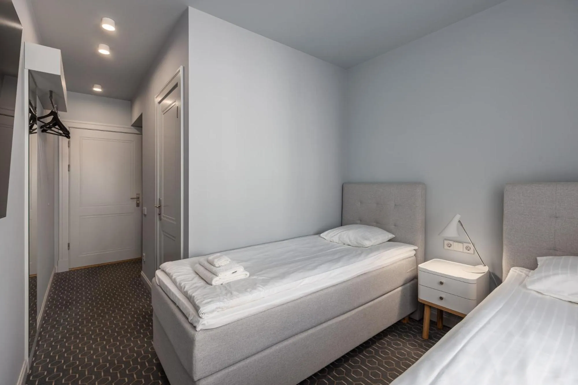 Bed in Roze Park Rooms