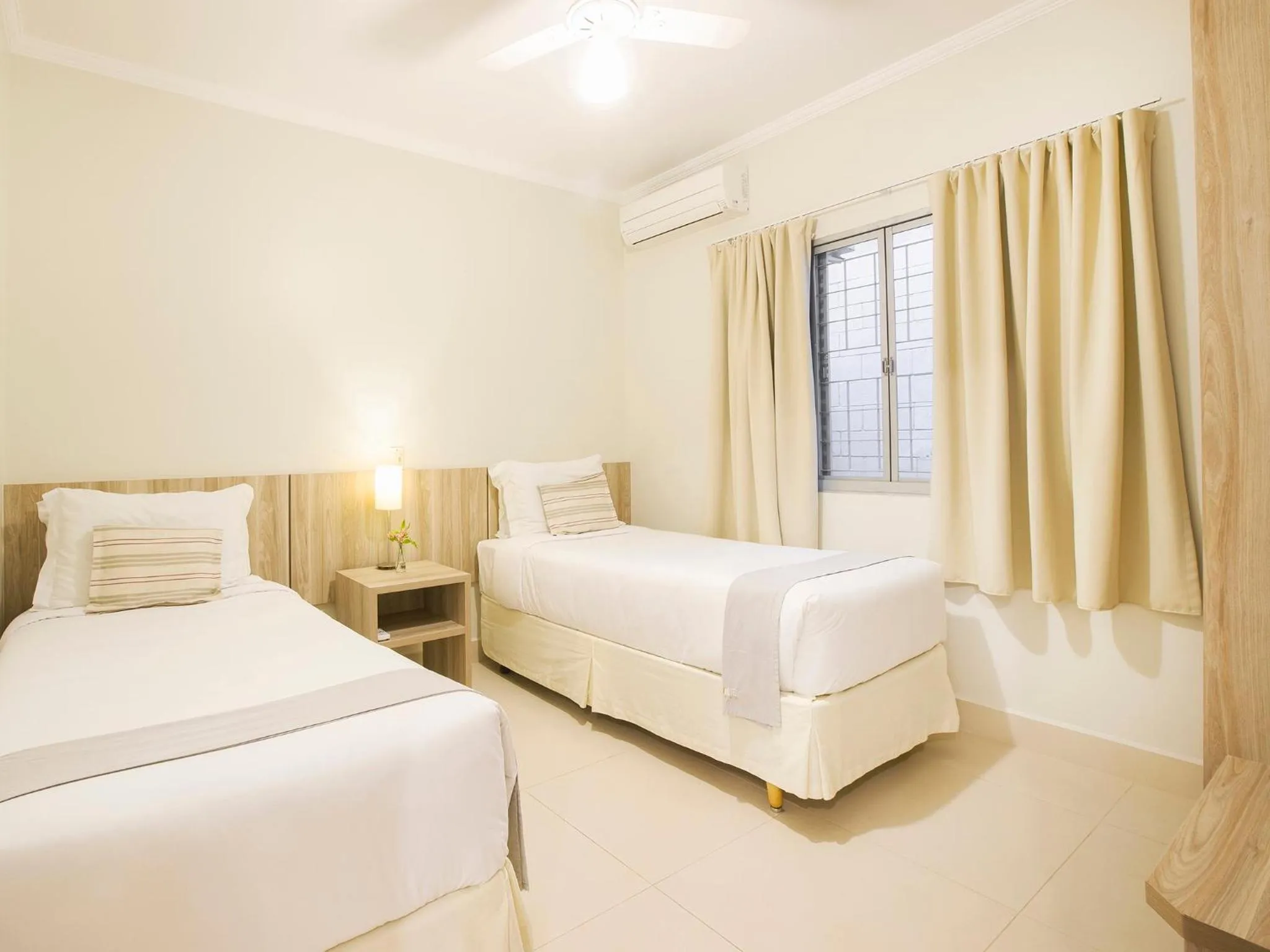 Bed in Vinhedo Plaza Hotel