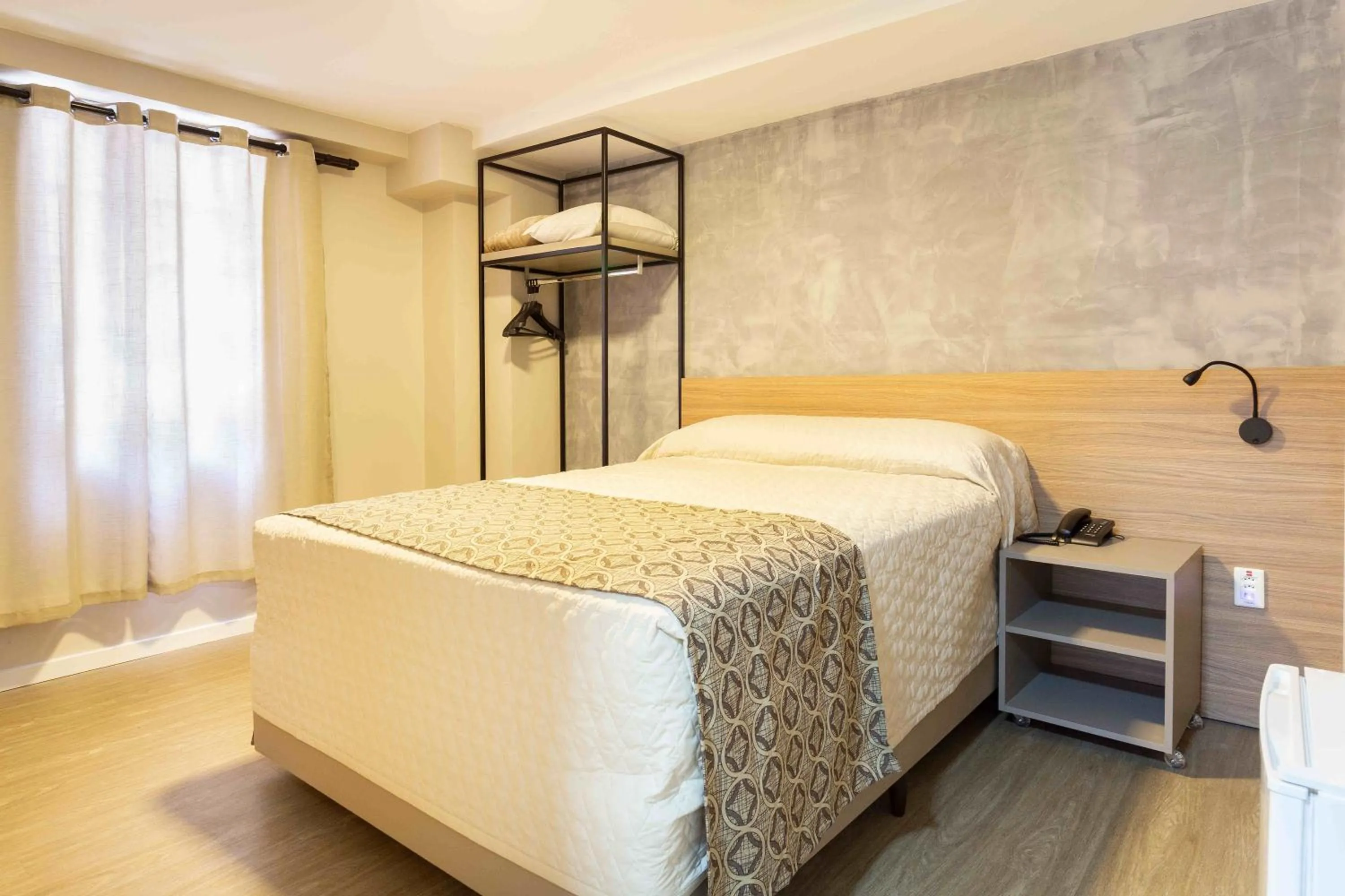 Bed in Hotel Dom Rafael Executivo