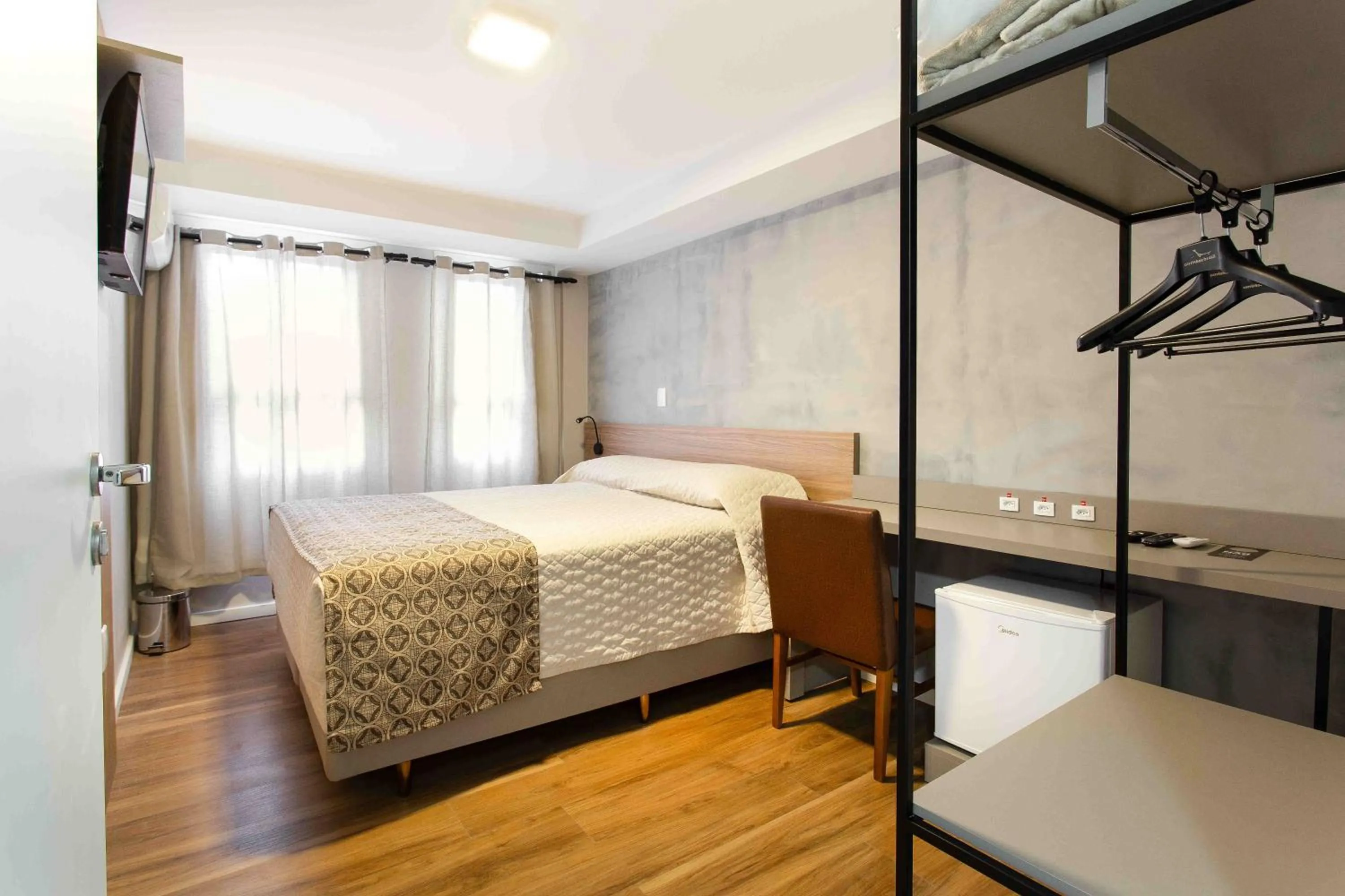 Bed in Hotel Dom Rafael Executivo