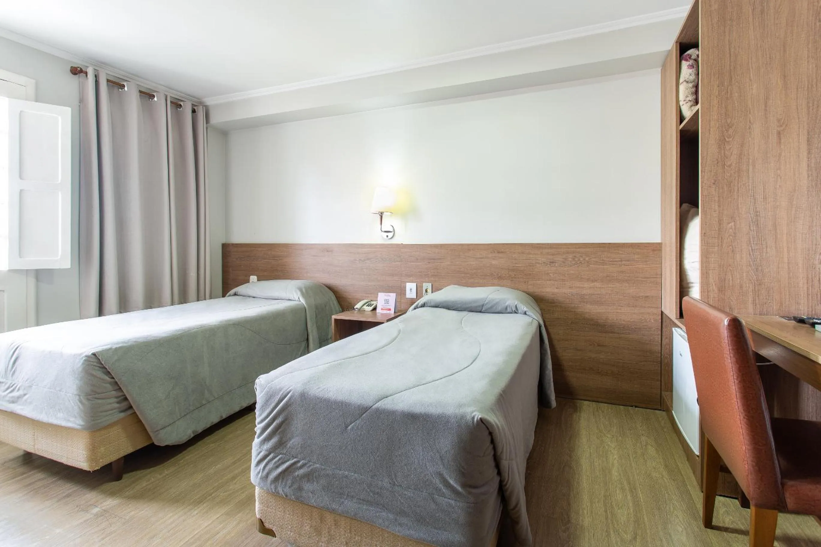 Bed in Hotel Dom Rafael Executivo