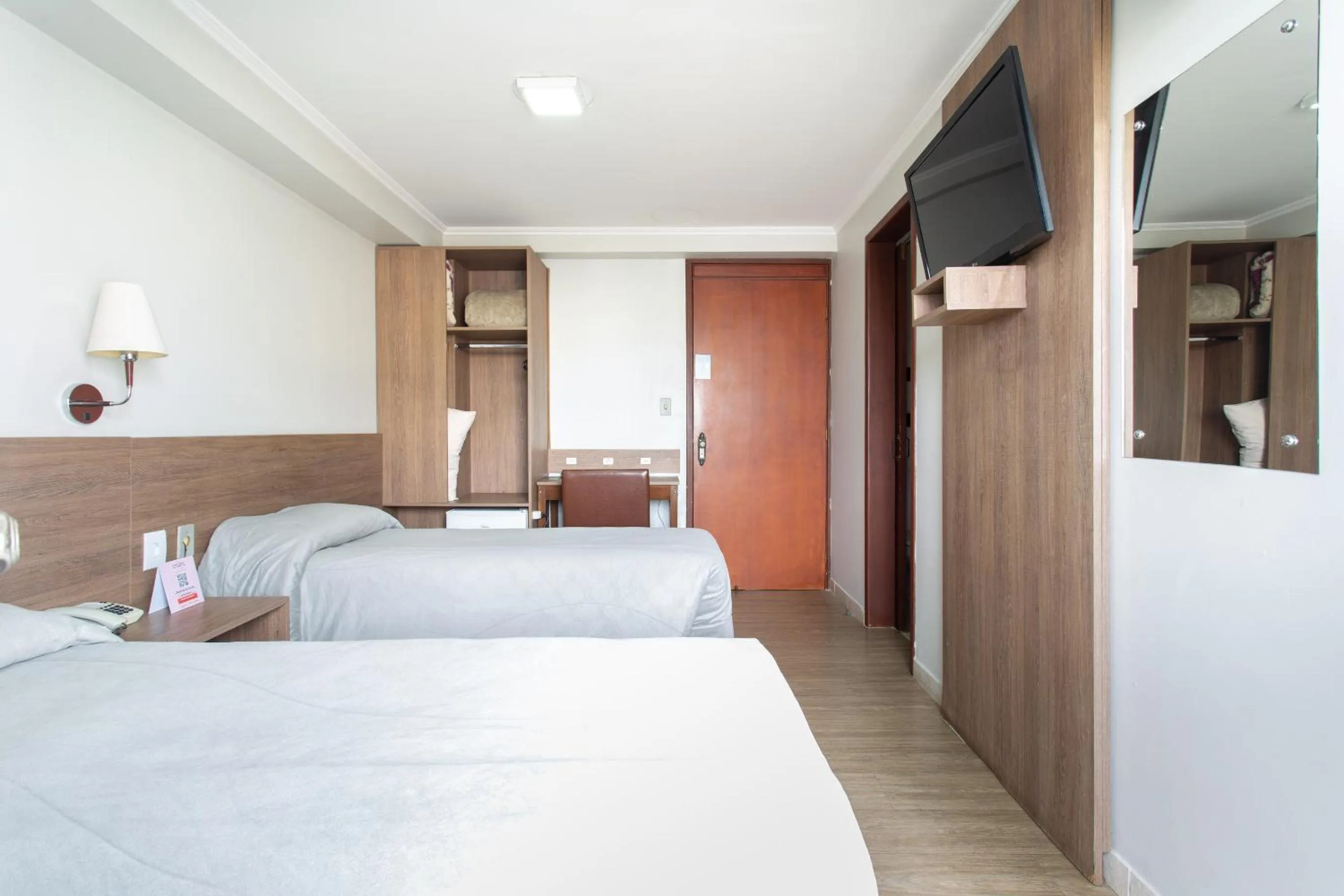 Bed in Hotel Dom Rafael Executivo