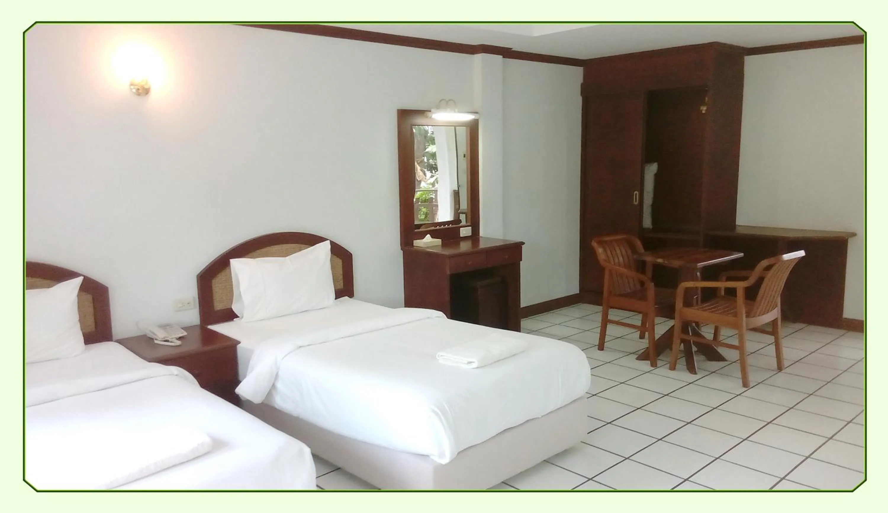 Bed in Thong Paeka Hotel