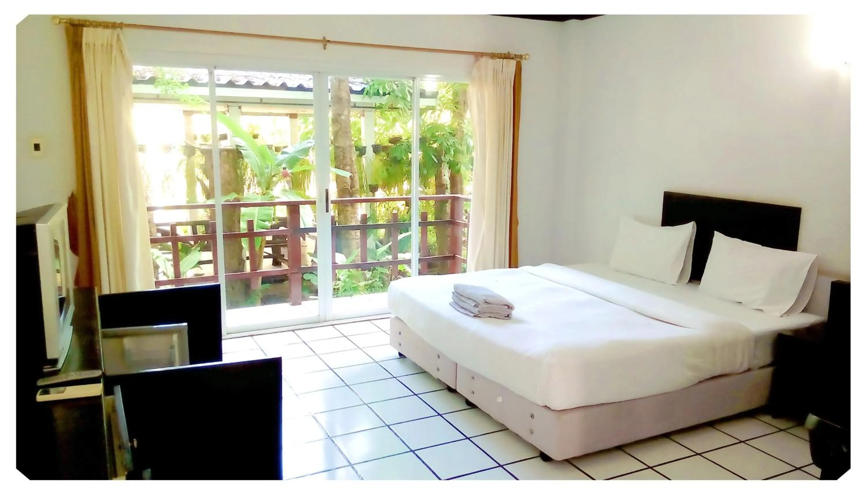 Bed in Thong Paeka Hotel