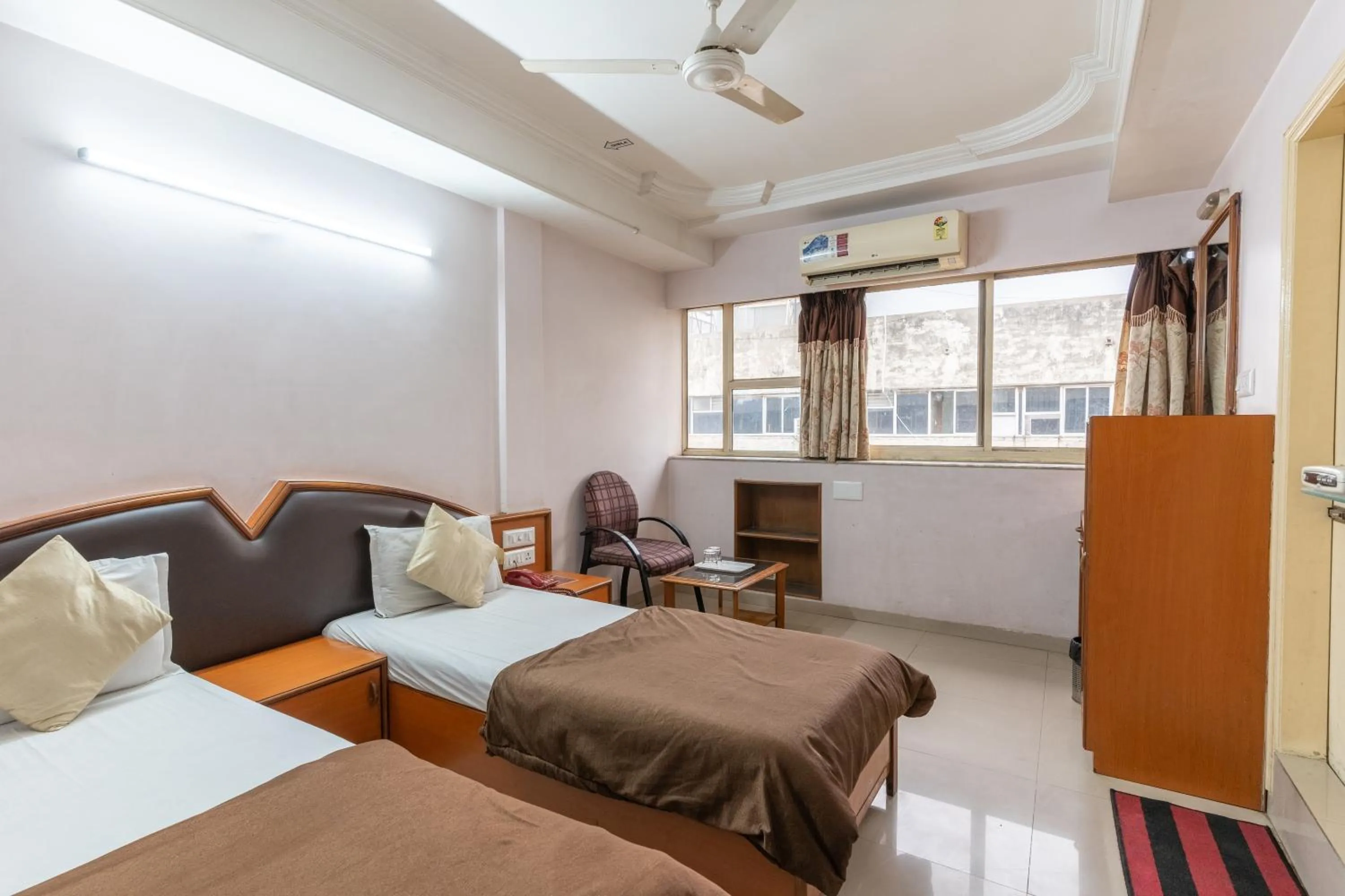 Bed in Hotel Sanmati