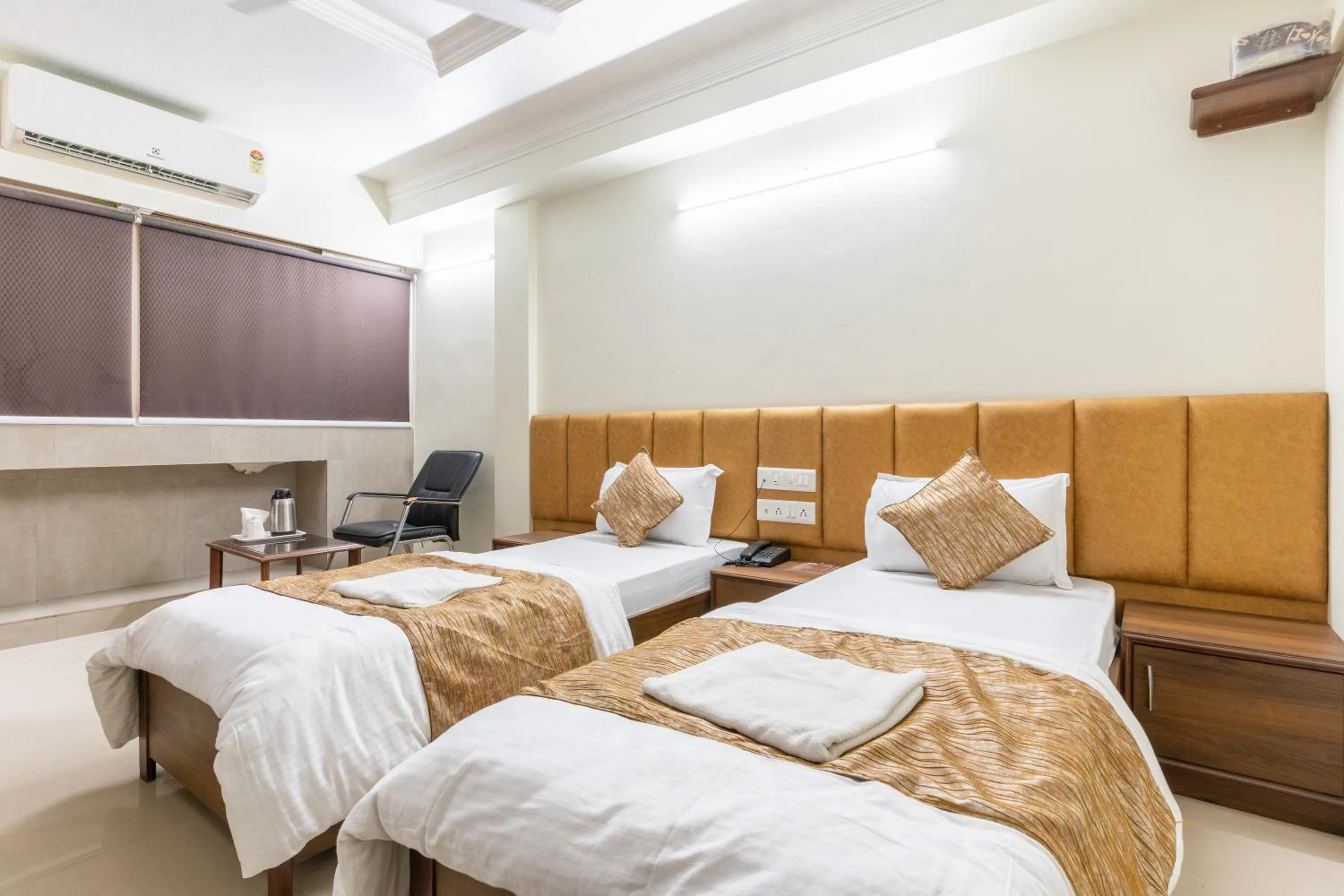 Bed in Hotel Sanmati