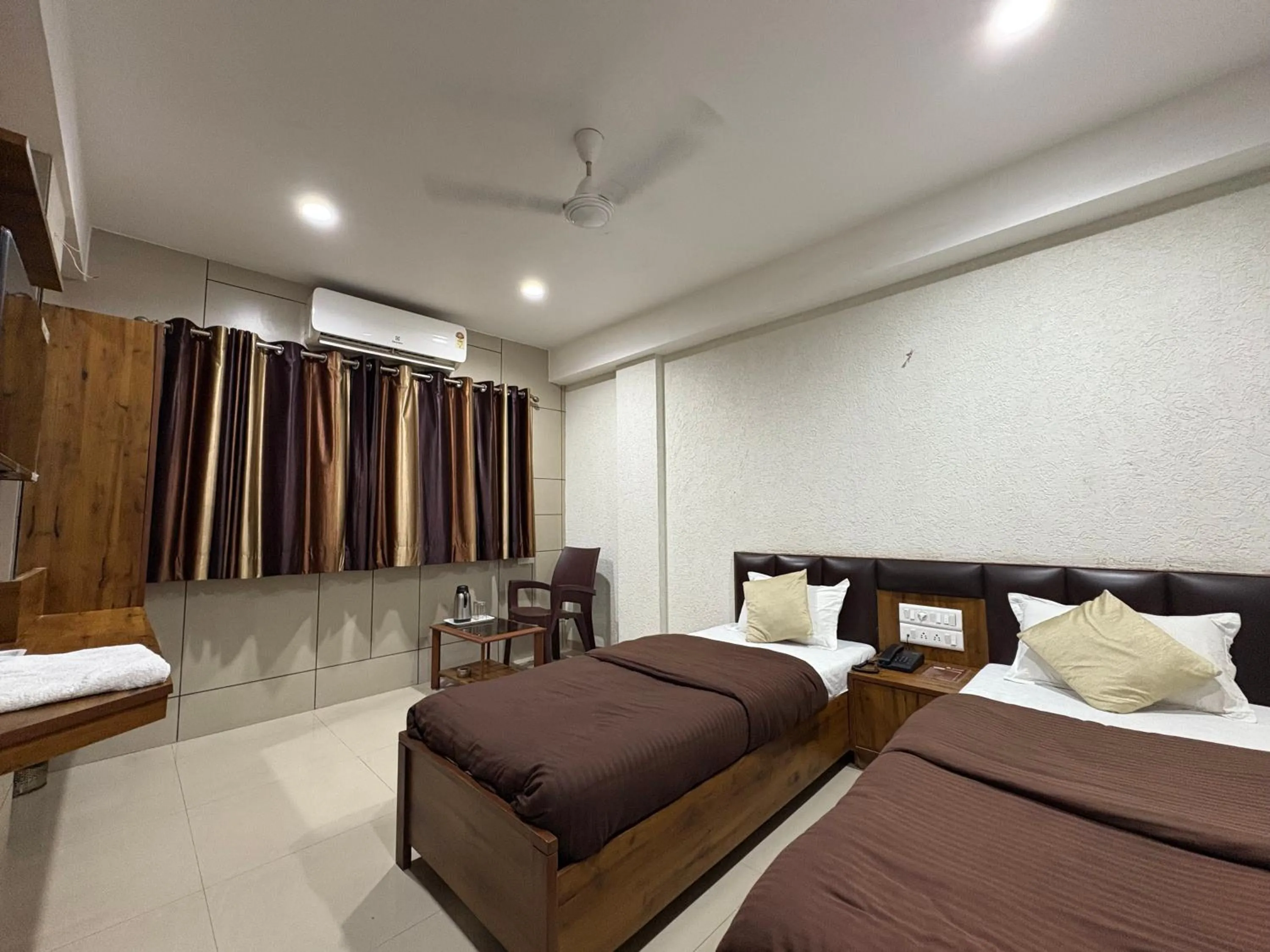 Bed in Hotel Sanmati