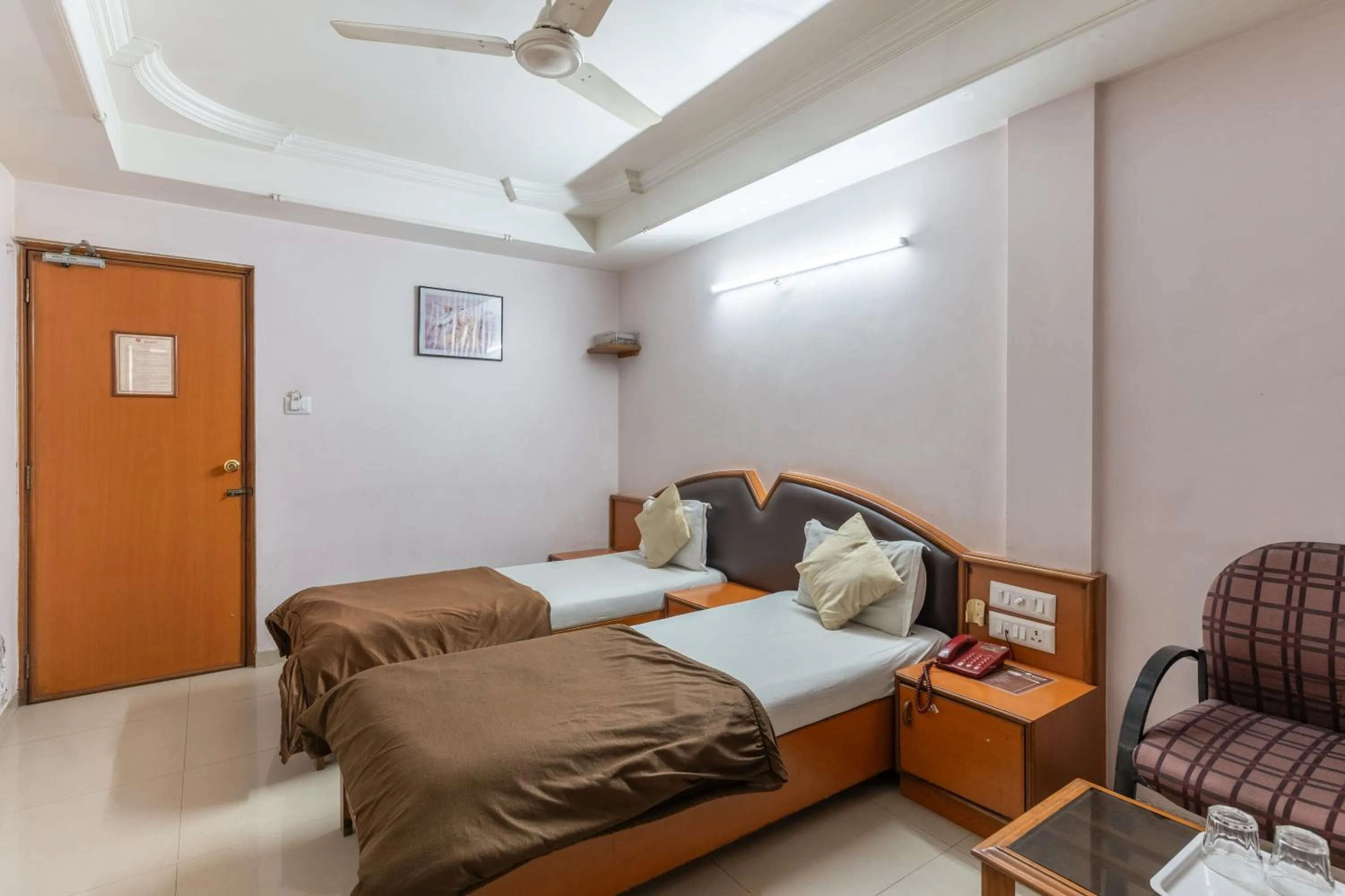 Bed in Hotel Sanmati