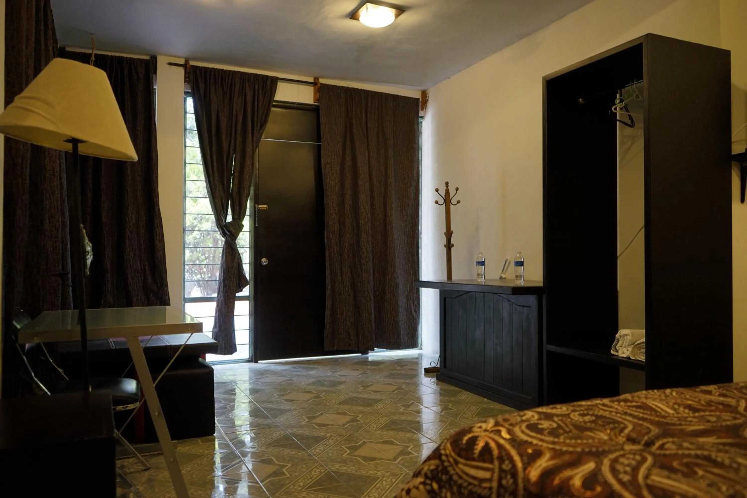 Bed in Telpochcalli Hotel & Temazcal