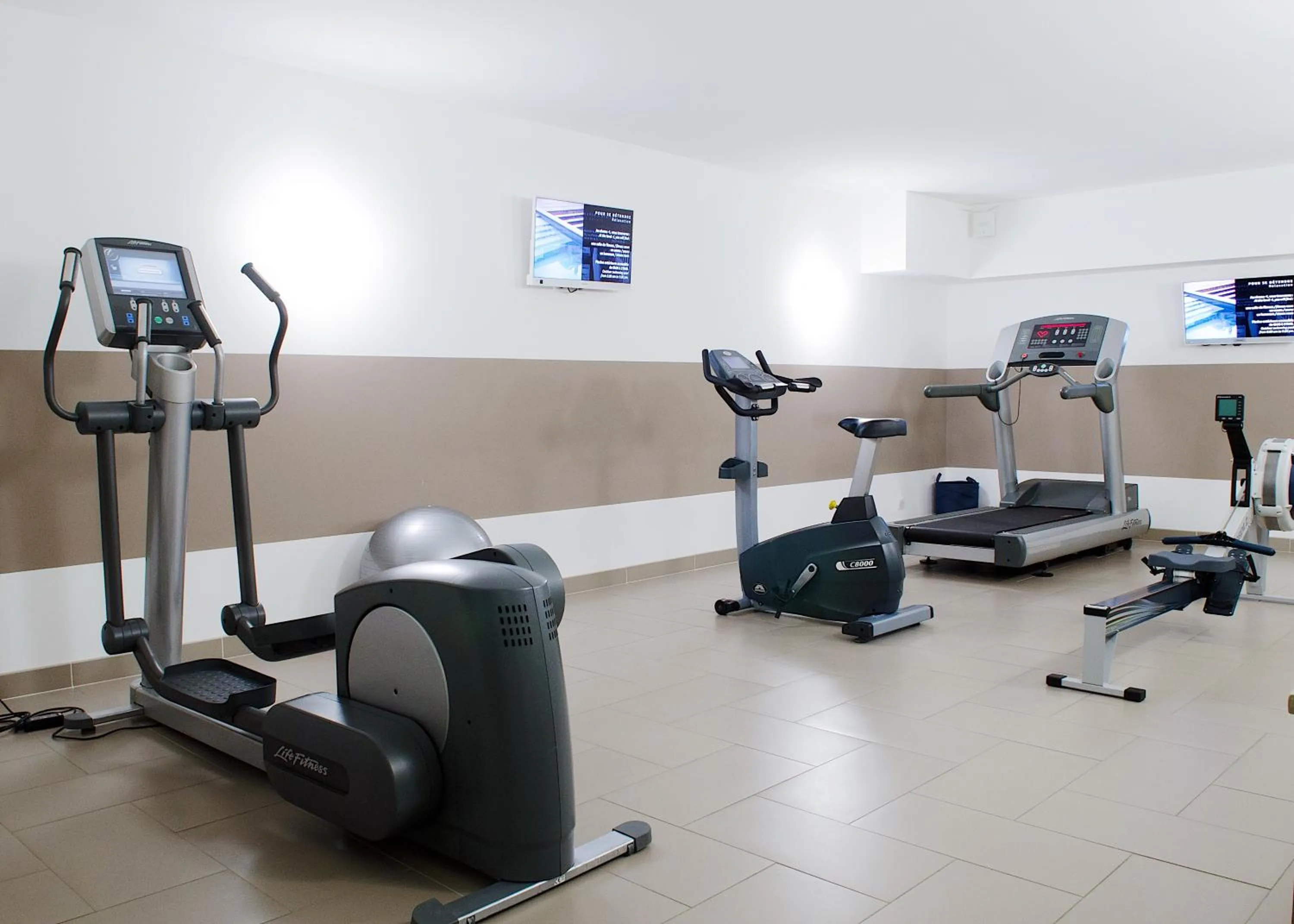 Fitness centre/facilities in Hôtel In Situ