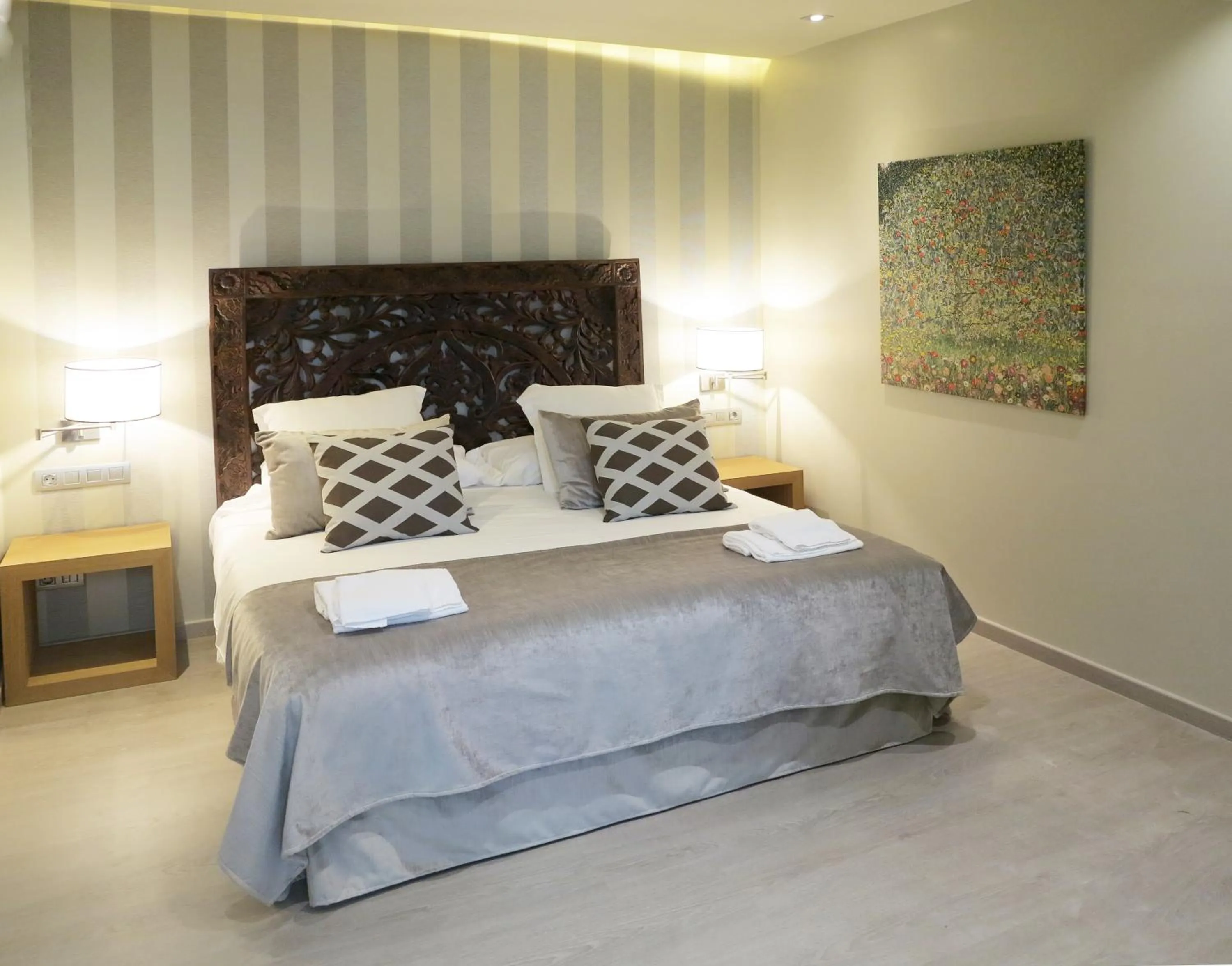 Bed in Serennia Exclusive Rooms