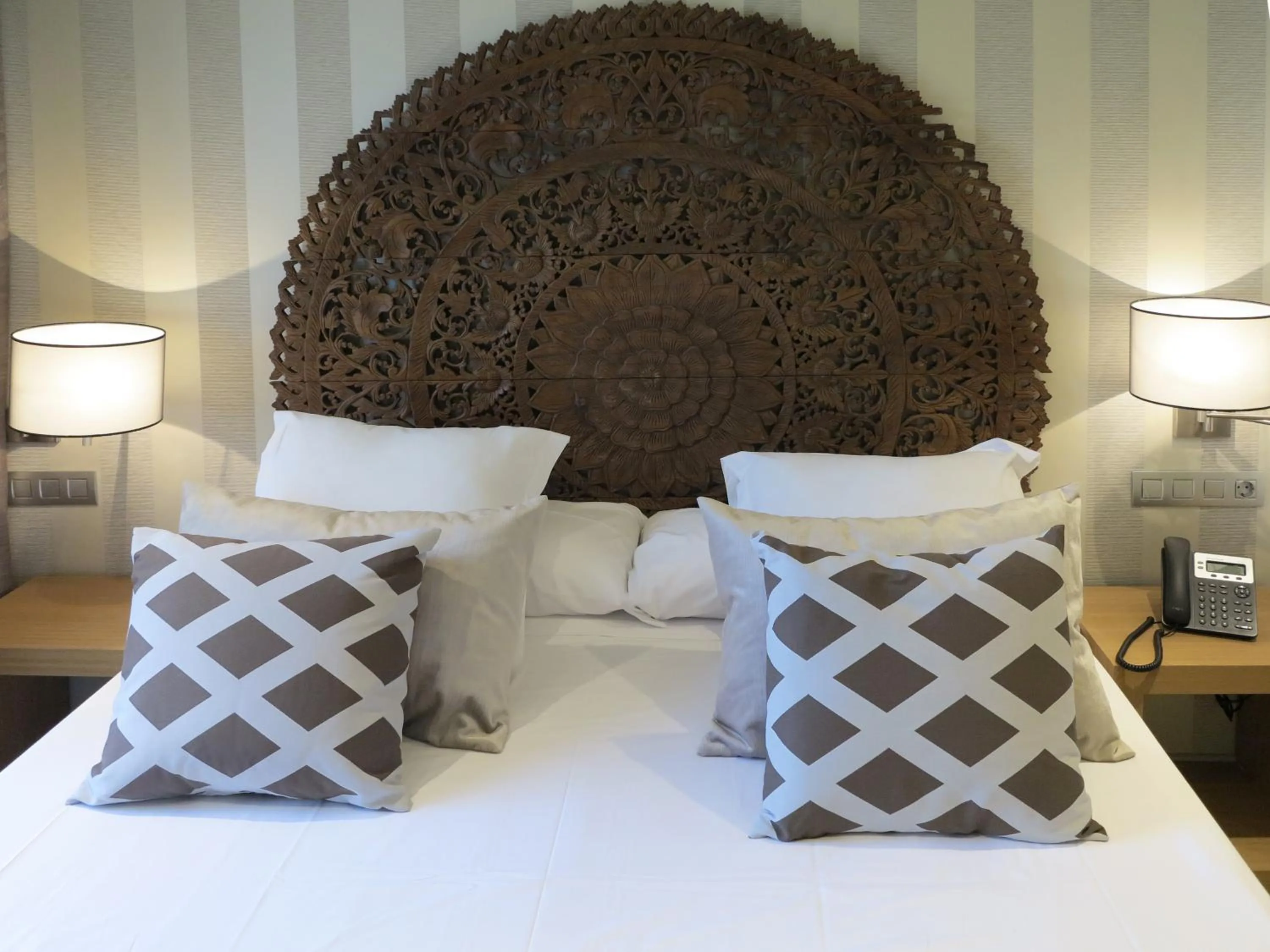 Bed in Serennia Exclusive Rooms