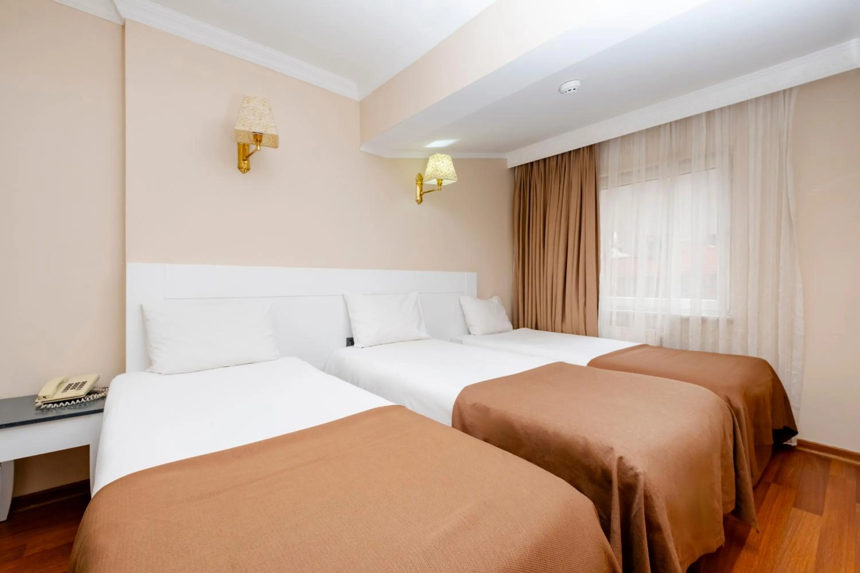 Bed in Peak Star Hotel