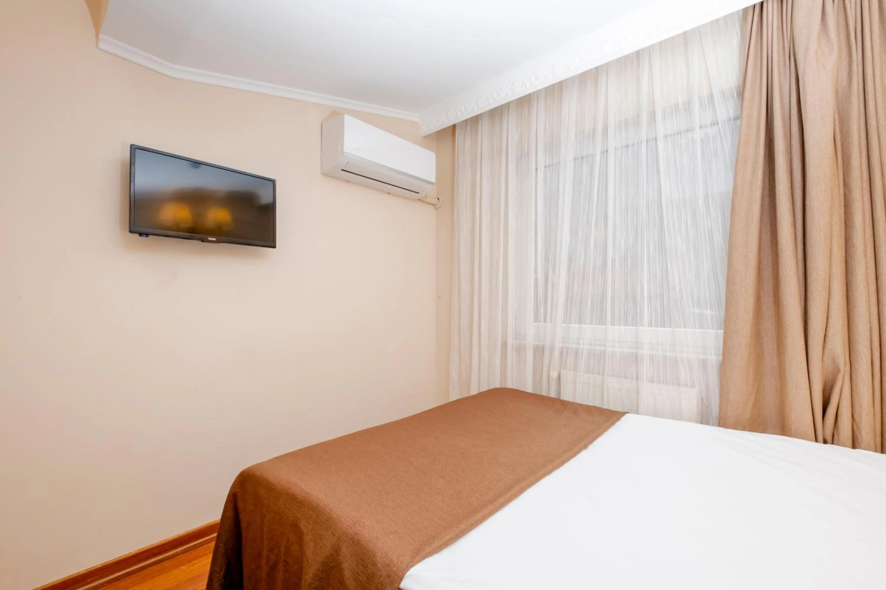 Bed in Peak Star Hotel