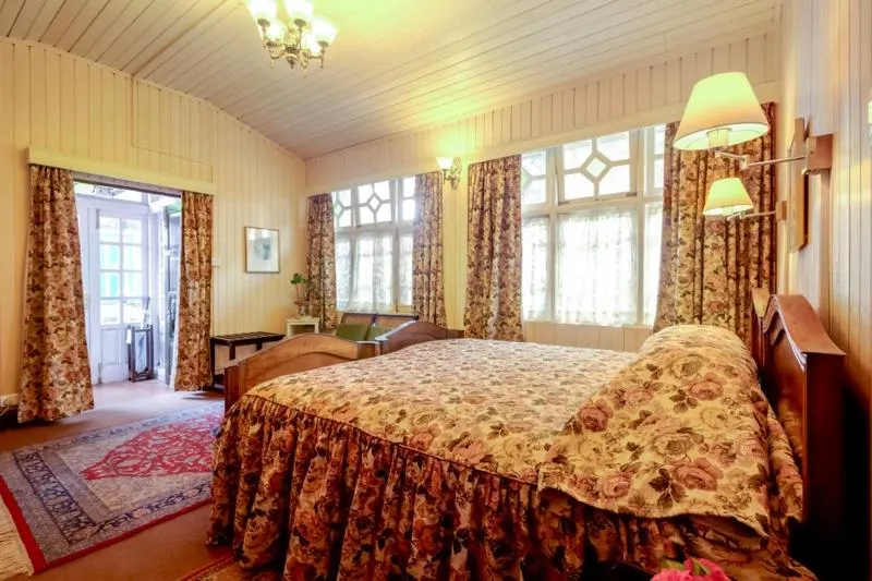 Bedroom in Windamere Hotel - A Colonial Heritage