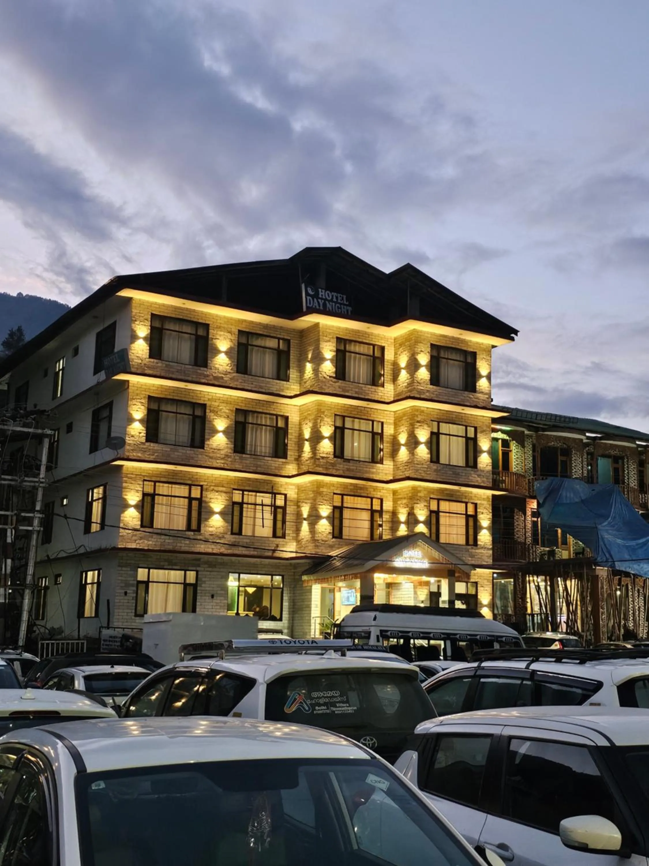 Property building in Hotel Day Night