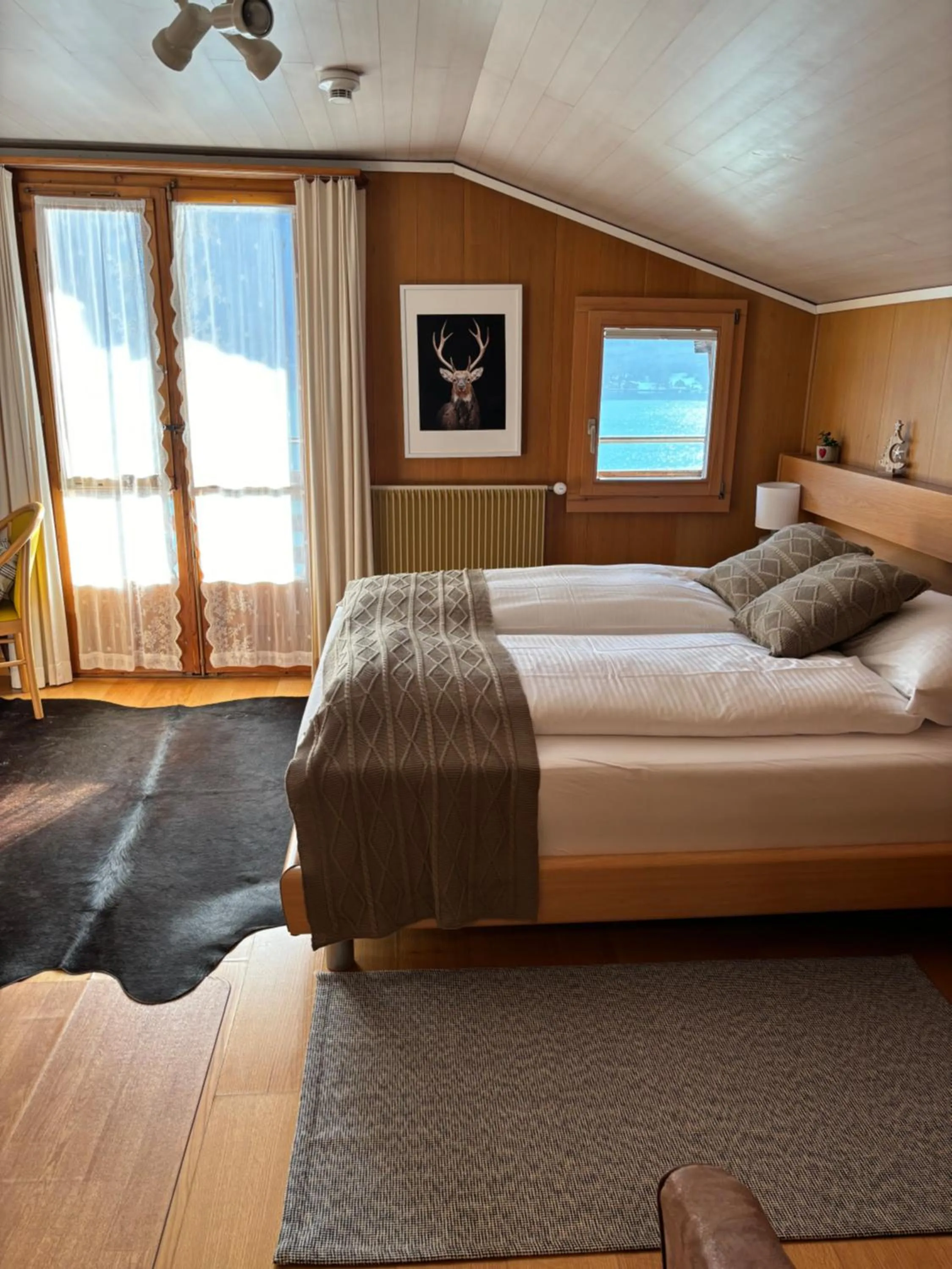 Bedroom, Bed in Alpina Boutique Hotel Interlaken - Ringgenberg - Adults only !