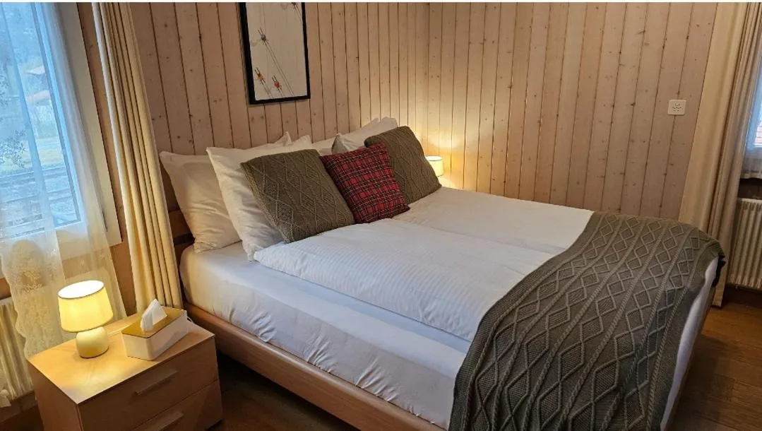 Bedroom, Bed in Alpina Boutique Hotel Interlaken - Ringgenberg - Adults only !